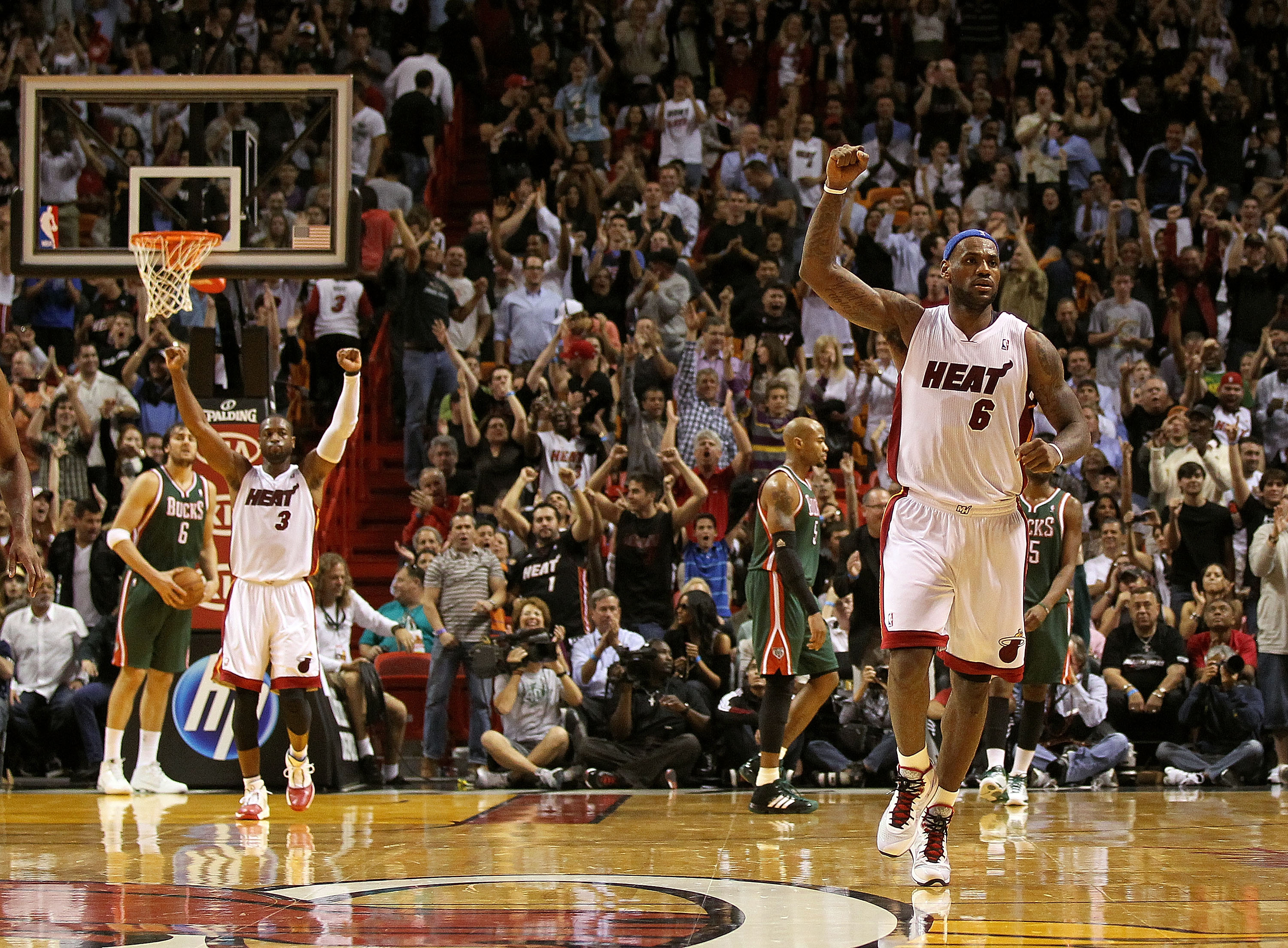 MIAMI, FL - JANUARY 04:  LeBron James #6 of the Miami Heat reacts after Mario Chalmers #15 hit a 3 pointer late in the game against the Milwaukee Bucks at American Airlines Arena on January 4, 2011 in Miami, Florida. NOTE TO USER: User expressly acknowled