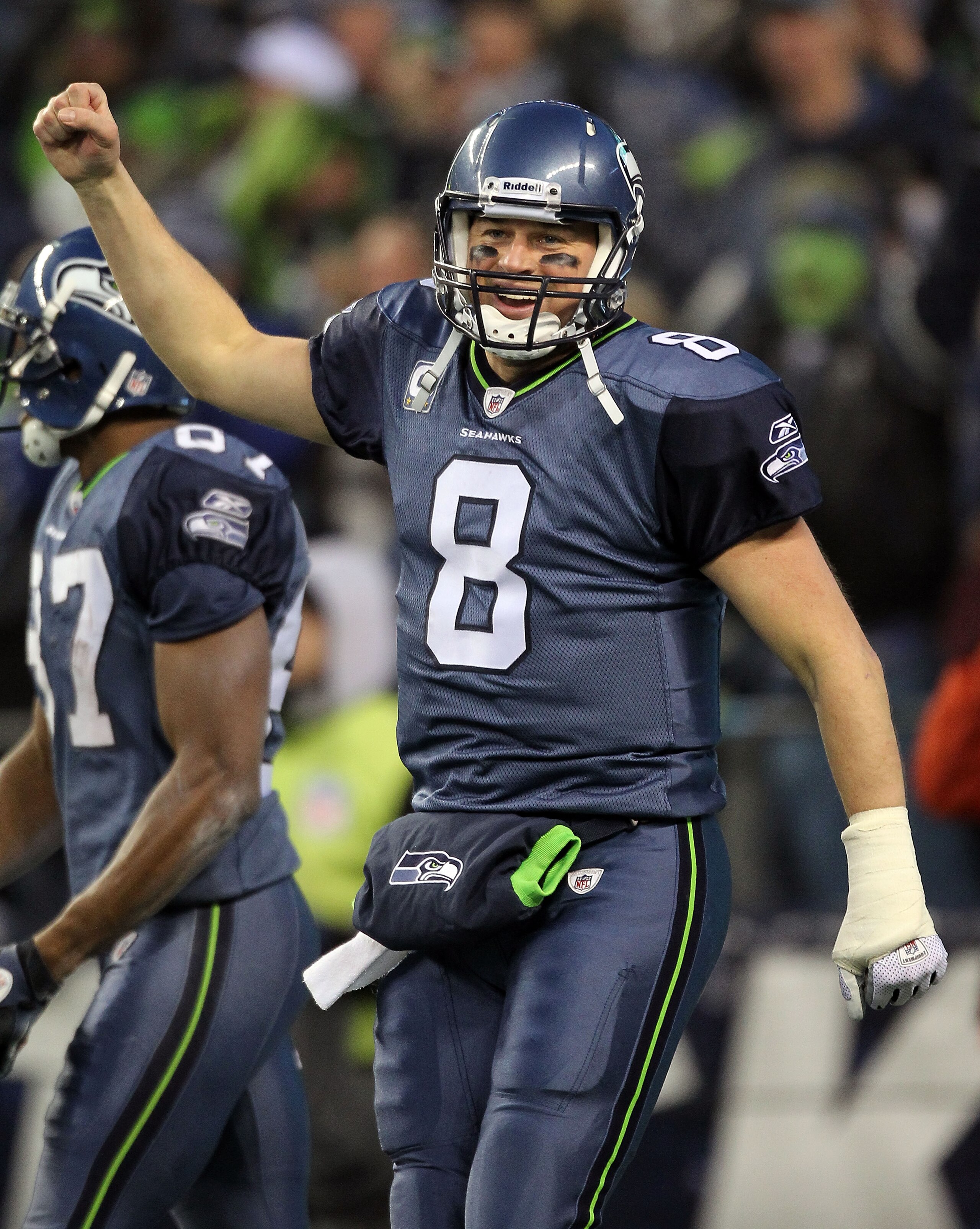 SEATTLE, WA - JANUARY 08: Quarterback Matt Hasselbeck #8 of the Seattle Seahawks celebrates after running back Marshawn Lynch #24 scores on a 67-yard run in the fourth quarter against the New Orleans Saints during the 2011 NFC wild-card playoff game at Q SEATTLE, WA - JANUARY 08: Quarterback Matt Hasselbeck #8 of the Seattle Seahawks celebrates after running back Marshawn Lynch #24 scores on a 67-yard run in the fourth quarter against the New Orleans Saints during the 2011 NFC wild-card playoff game at Q
