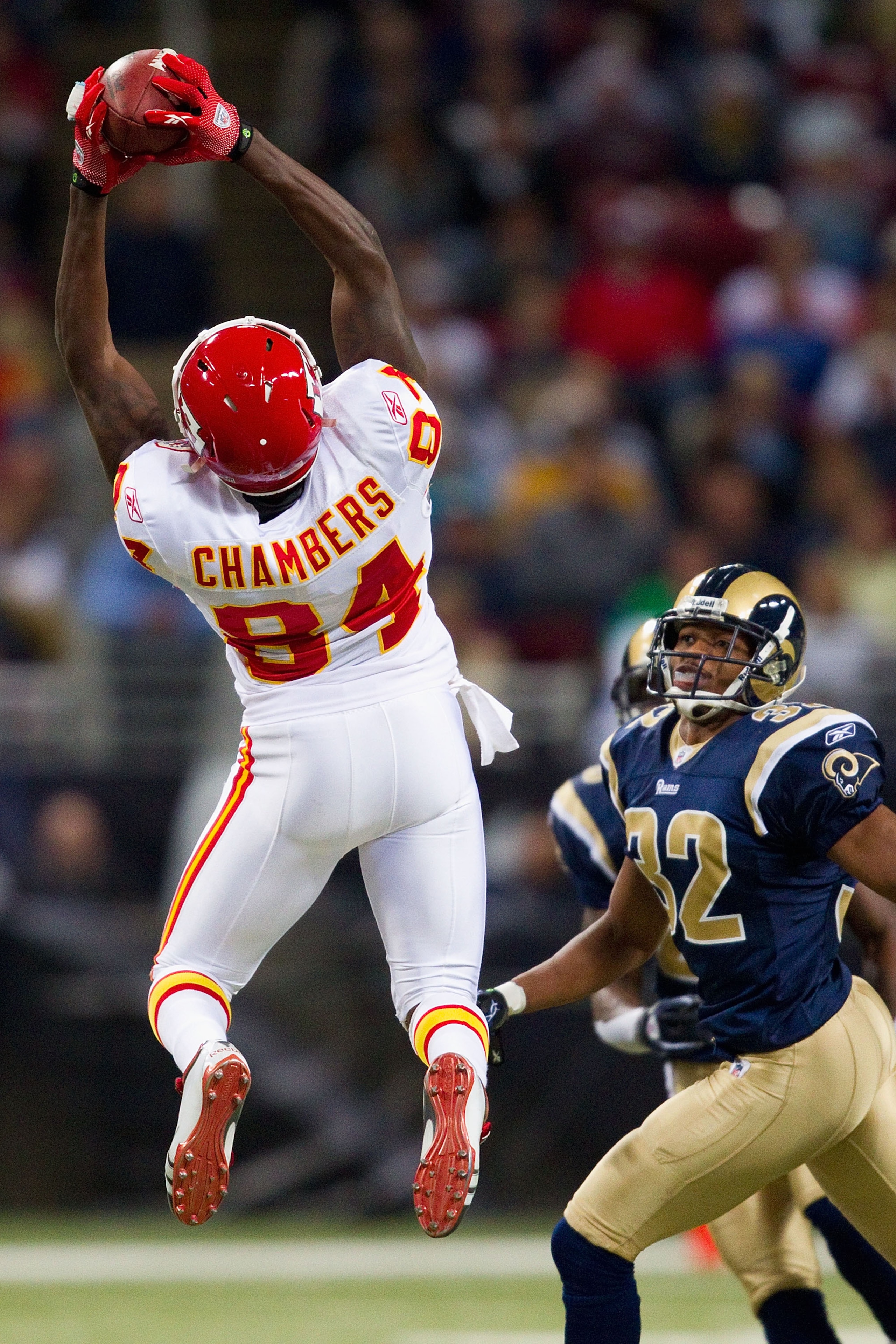 ST. LOUIS, MO - DECEMBER 19: Chris Chambers #84 of the Kansas City Chiefs hauls in a pass against Bradley Fletcher #32 of the St. Louis Rams at the Edward Jones Dome on December 19, 2010 in St. Louis, Missouri.  The Chiefs beat the Rams 27-13.  (Photo by