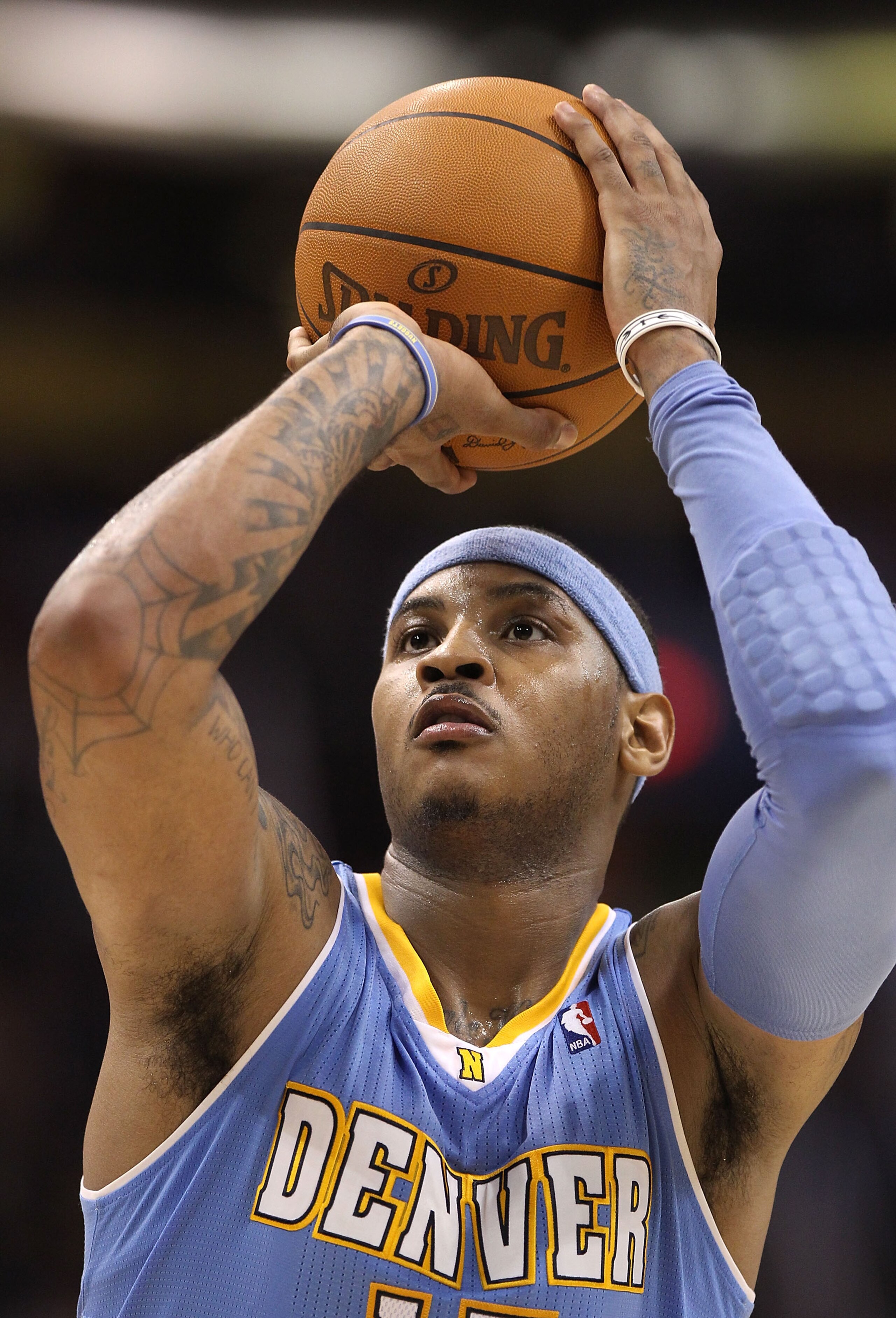 PHOENIX - NOVEMBER 15:  Carmelo Anthony #15 of the Denver Nuggets shoots a free throw shot during the NBA game against the Phoenix Suns at US Airways Center on November 15, 2010 in Phoenix, Arizona.  The Suns defeated the Nuggets 100-94.  NOTE TO USER: Us