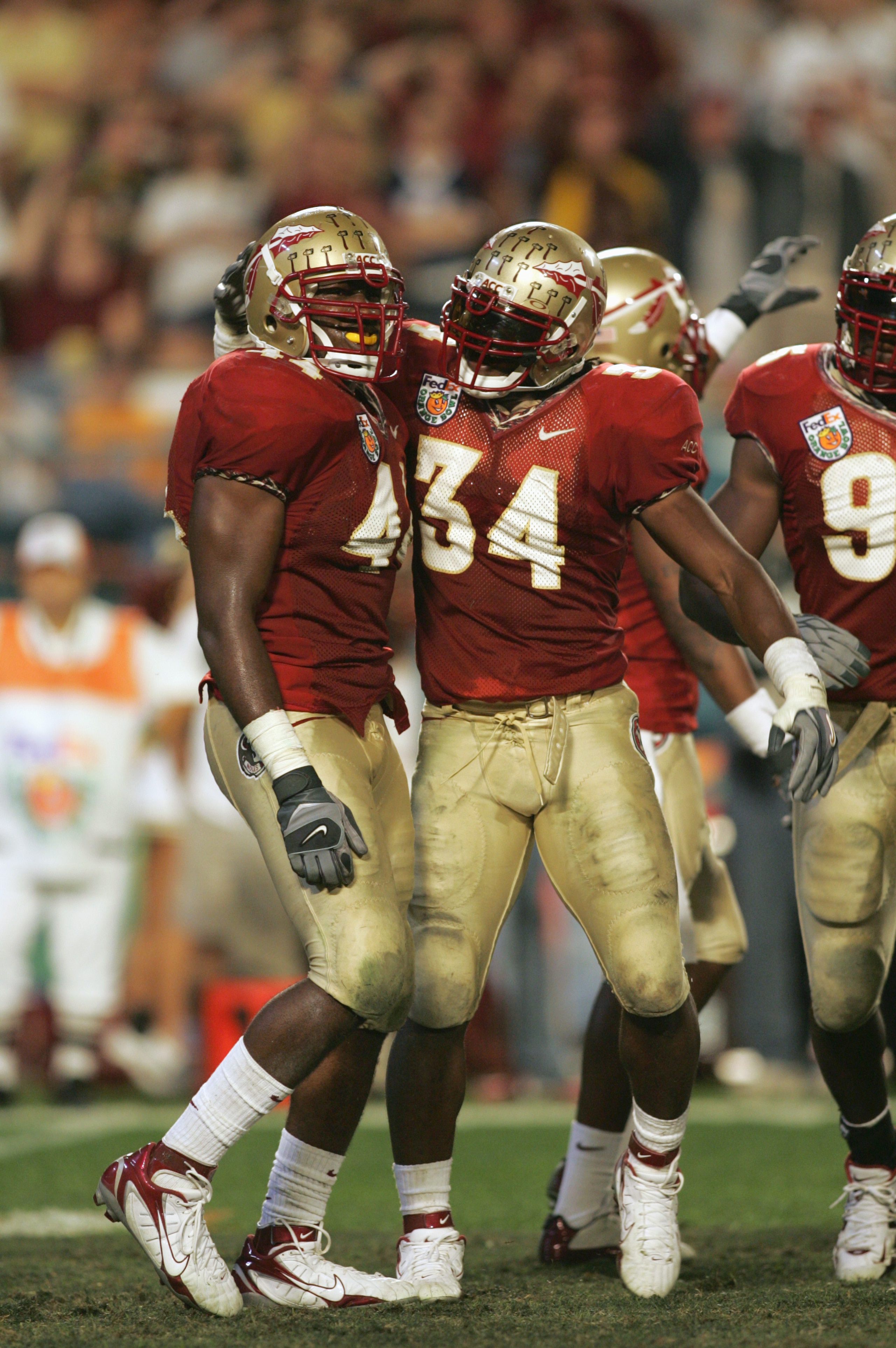 MIAMI GARDENS, FL - JANUARY 3: Ernie Sims #34of the Florida State Seminoles congratuales Sam McGrew #44 during the 72nd Fed Ex Orange Bowl against the Penn State Nittany Lions at Dolphins Stadium on January 3, 2005 in Miami Gardens, Florida. Penn State d MIAMI GARDENS, FL - JANUARY 3: Ernie Sims #34of the Florida State Seminoles congratuales Sam McGrew #44 during the 72nd Fed Ex Orange Bowl against the Penn State Nittany Lions at Dolphins Stadium on January 3, 2005 in Miami Gardens, Florida. Penn State d