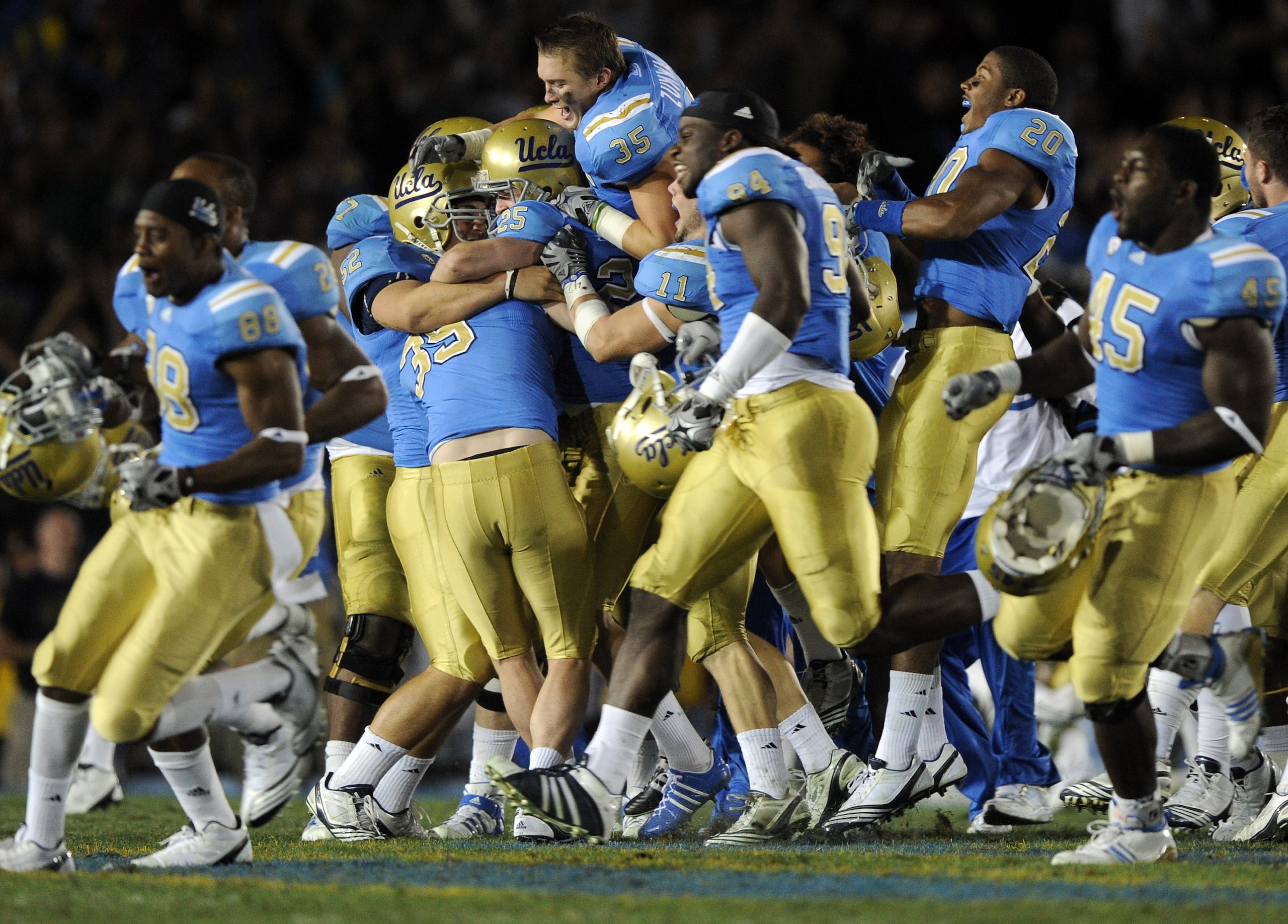 PASADENA, CA - NOVEMBER 06: Kai Forbath #25 of the UCLA Bruins is hugged by his teammates in celebration of a last second field goal to win the game 17-14 over the Oregon State Beavers during the fourth quarter at the Rose Bowl on November 6, 2010 in Pas PASADENA, CA - NOVEMBER 06: Kai Forbath #25 of the UCLA Bruins is hugged by his teammates in celebration of a last second field goal to win the game 17-14 over the Oregon State Beavers during the fourth quarter at the Rose Bowl on November 6, 2010 in Pas