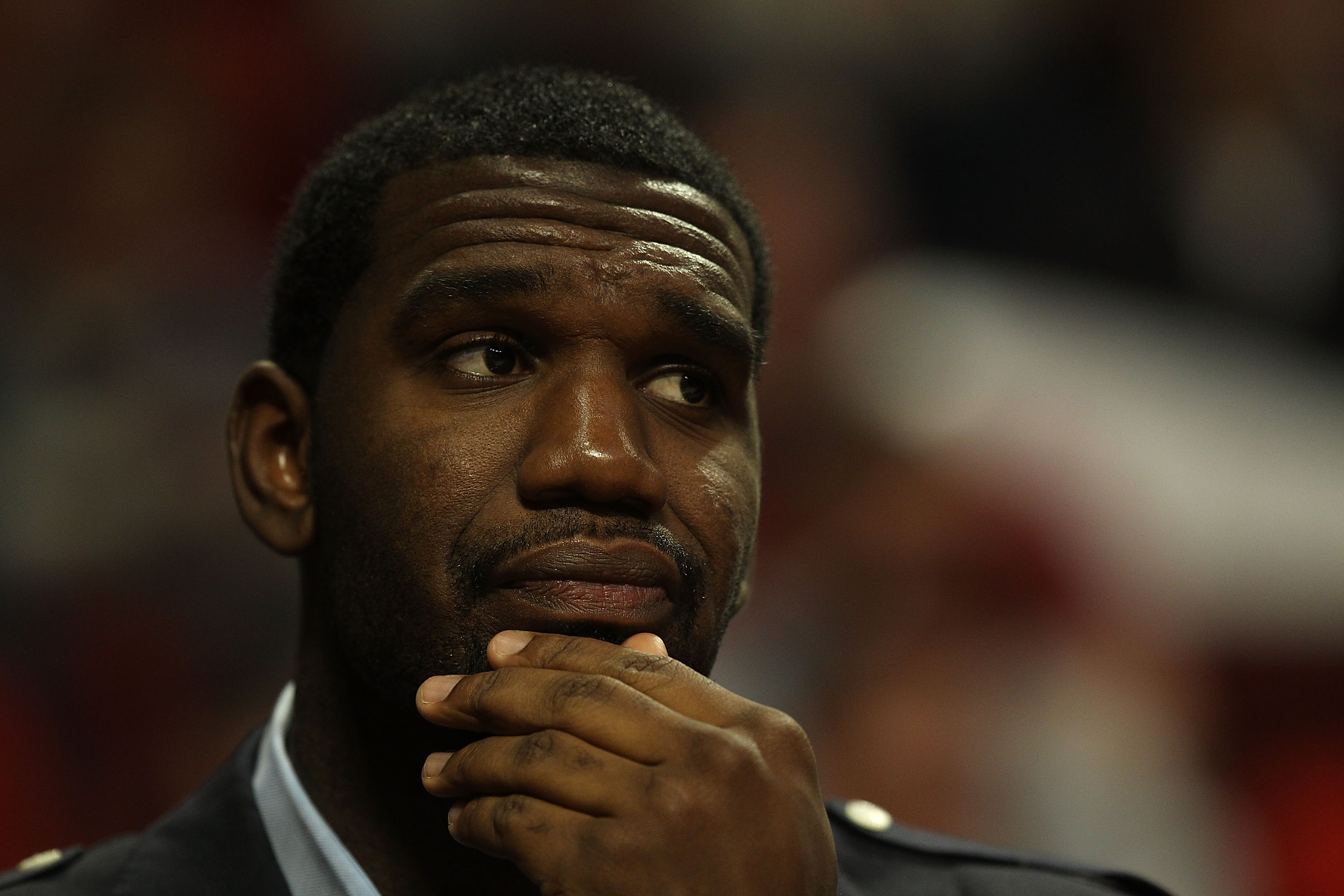 CHICAGO - NOVEMBER 01: Greg Oden #52 of the Portland Trail Blazers watches from the bench as his teammates take on the Chicago Bulls at the United Center on November 1, 2010 in Chicago, Illinois. The Bulls defeated the Trail Blazers 110-98. NOTE TO USER: