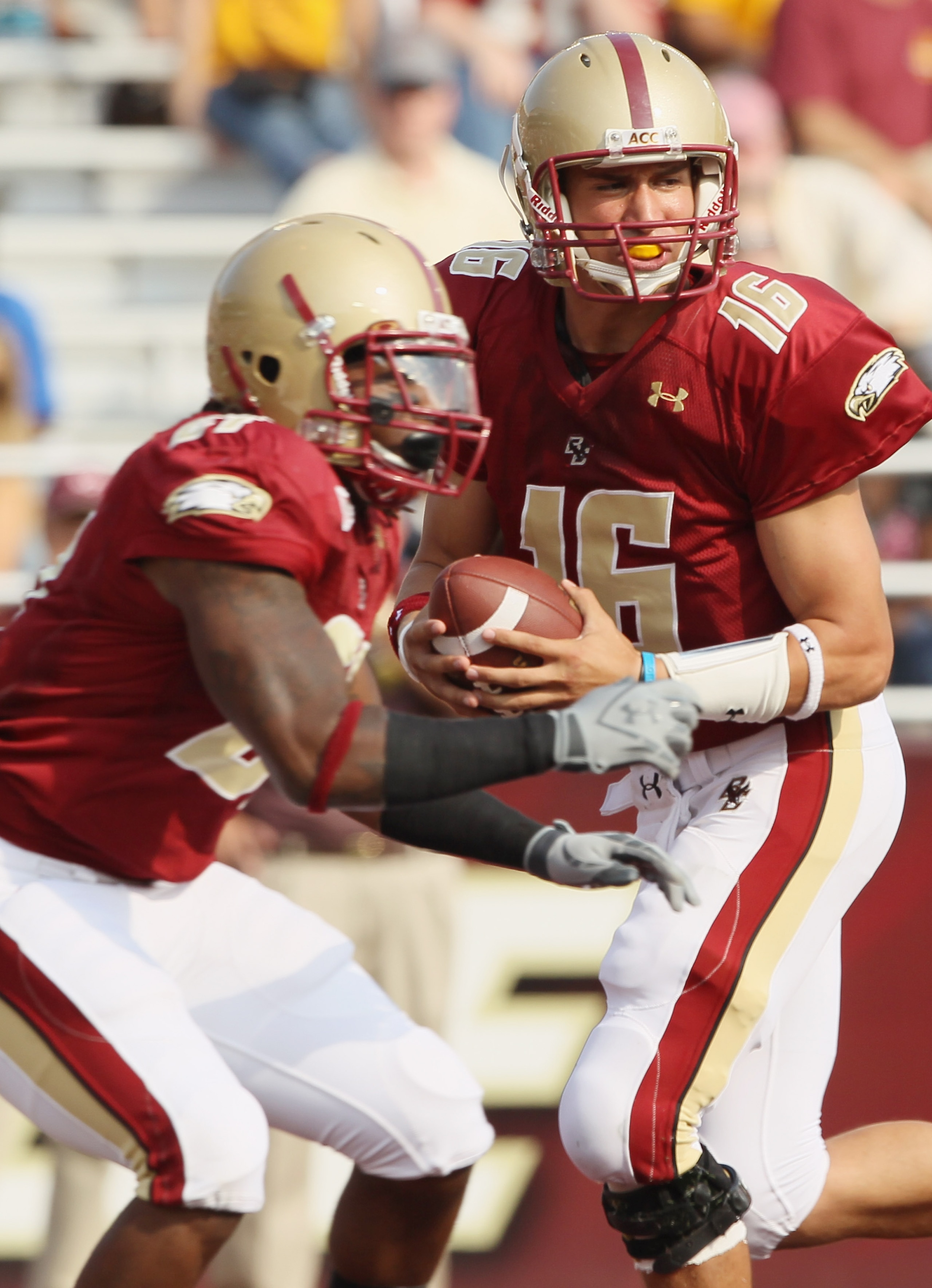 CHESTNUT HILL, MA - SEPTEMBER 25: Mike Marscovetra #16 of the Boston College Eagles fakes the handoff in the fourth quarter against the Virginia Tech Hokies on September 25, 2010 at Alumni Stadium in Chestnut Hill, Massachusetts. Virginia Tech defeated B CHESTNUT HILL, MA - SEPTEMBER 25: Mike Marscovetra #16 of the Boston College Eagles fakes the handoff in the fourth quarter against the Virginia Tech Hokies on September 25, 2010 at Alumni Stadium in Chestnut Hill, Massachusetts. Virginia Tech defeated B