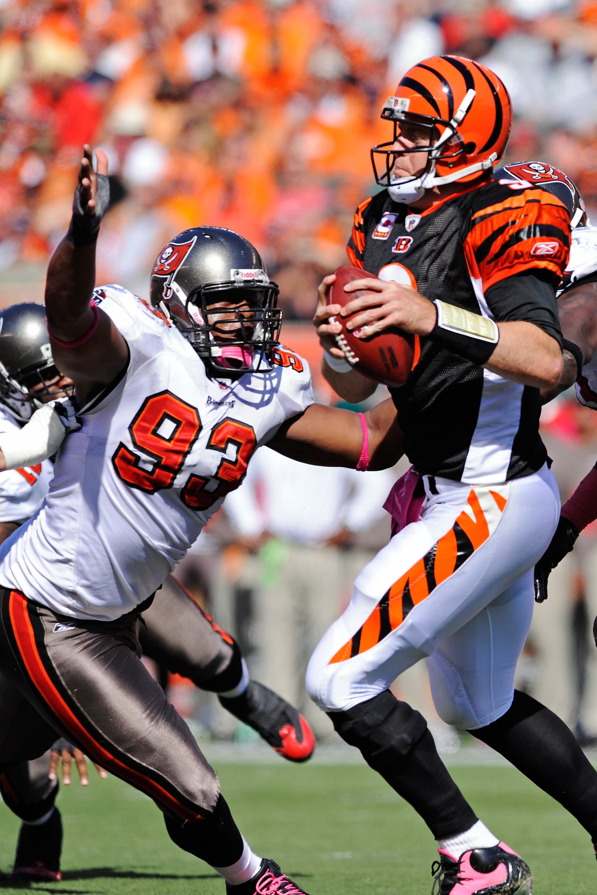 CINCINNATI, OH - OCTOBER 10:  Gerald McCoy #93 of the Tampa Bay Buccaneers puts pressure on quarterback Carson Palmer #9 of the Cincinnati Bengals at Paul Brown Stadium on October 10, 2010 in Cincinnati, Ohio.  (Photo by Jamie Sabau/Getty Images)