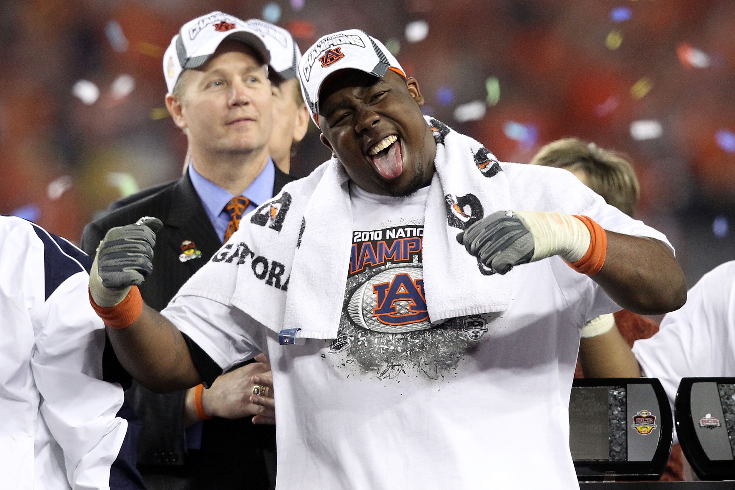 GLENDALE, AZ - JANUARY 10:  Nick Fairley #90 of the Auburn Tigers celebrates the Tigers 22-19 victory against the Oregon Ducks during the Tostitos BCS National Championship Game at University of Phoenix Stadium on January 10, 2011 in Glendale, Arizona.  (