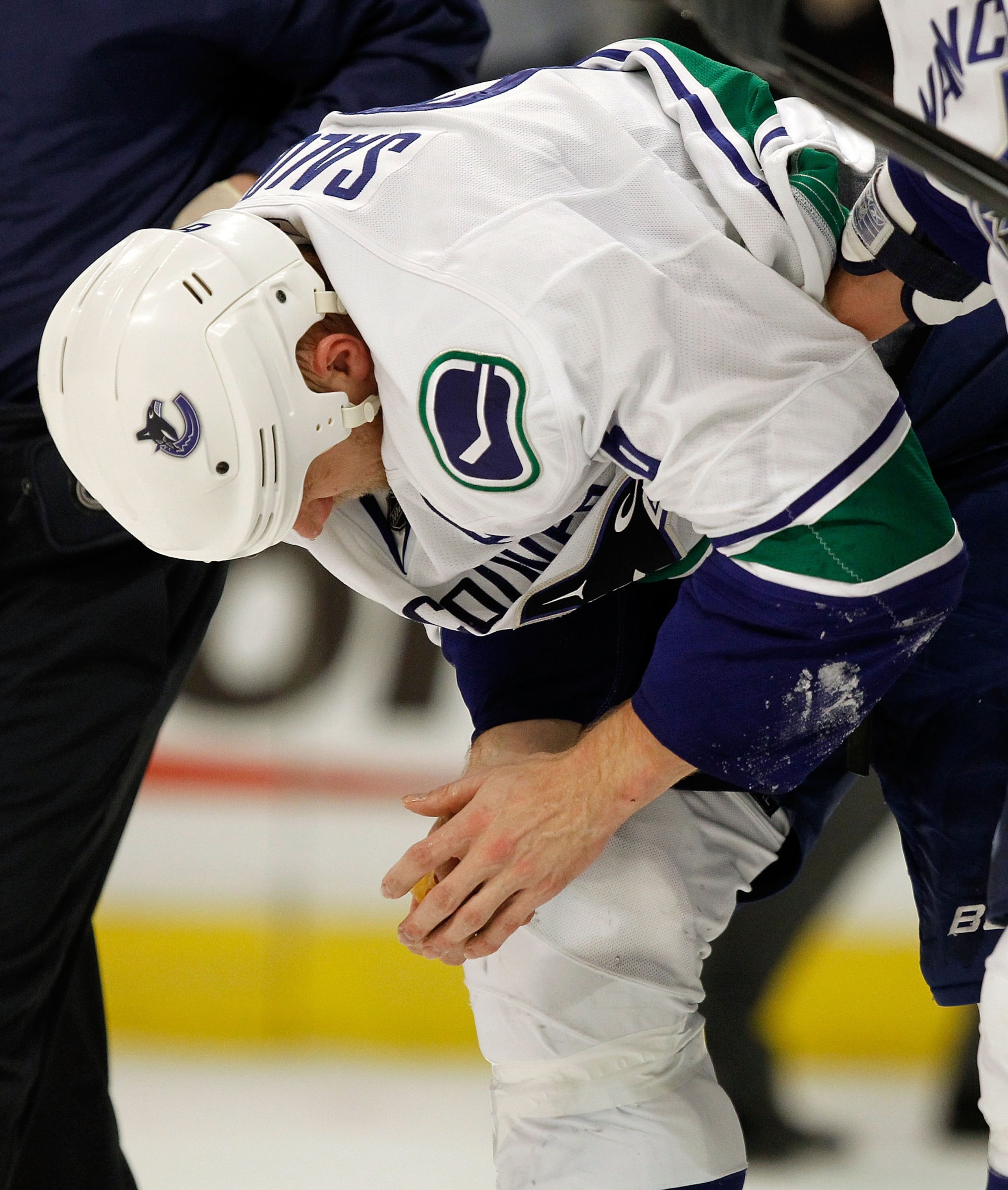 CHICAGO - MAY 09: Sami Salo #6 of the Vancouver Canucks skates off of the ice at the end of the first period after suffering an injury against the Chicago Blackhawks in Game Five of the Western Conference Semifinals during the 2010 NHL Stanley Cup Playoff