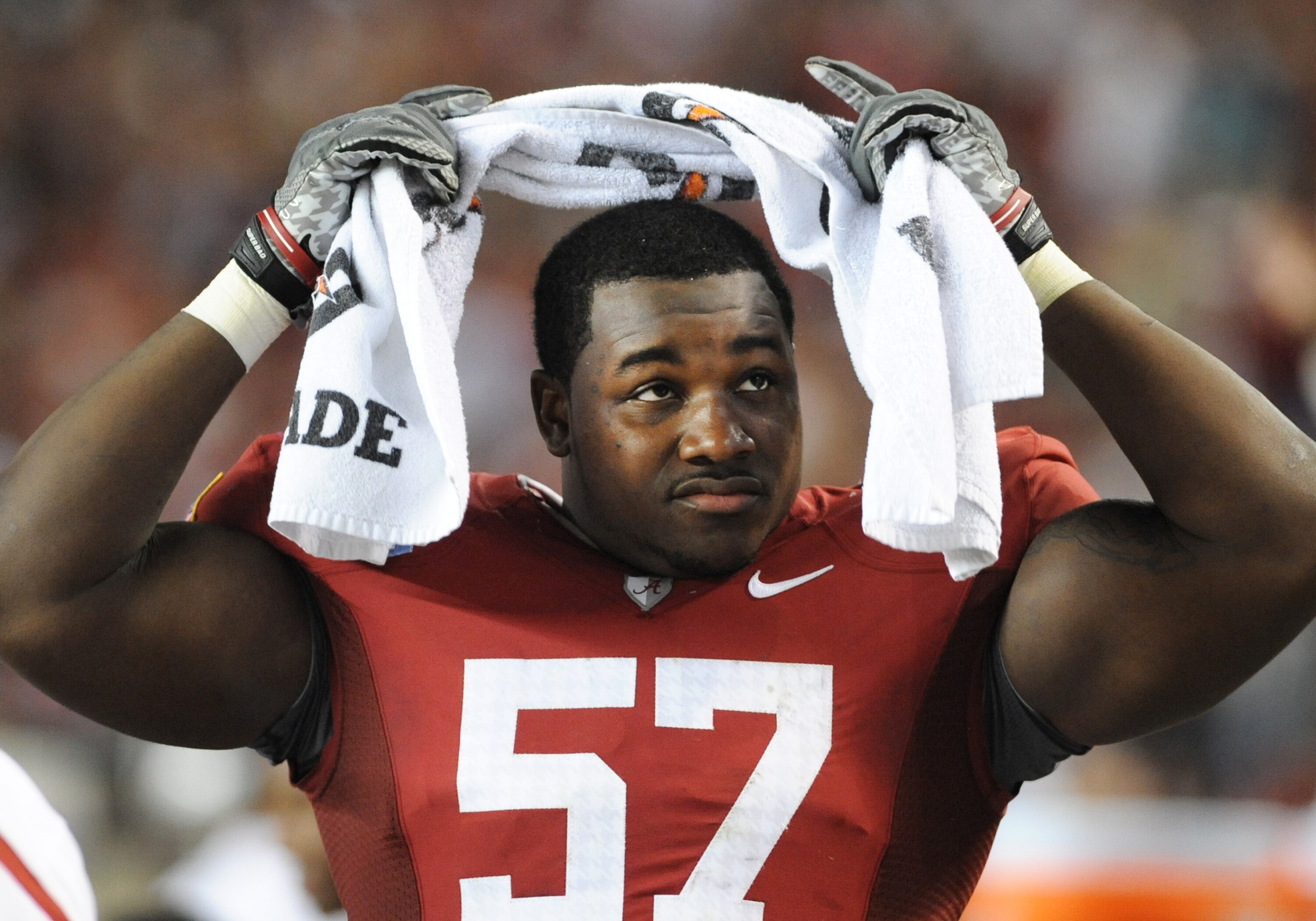 TUSCALOOSA, AL - NOVEMBER 13: Defensive lineman Marcell Dareus #57 of the Alabama Crimson Tide watches play against the Mississippi State Bulldogs November 13, 2010 at Bryant-Denny Stadium in Tuscaloosa, Alabama.  (Photo by Al Messerschmidt/Getty Images)