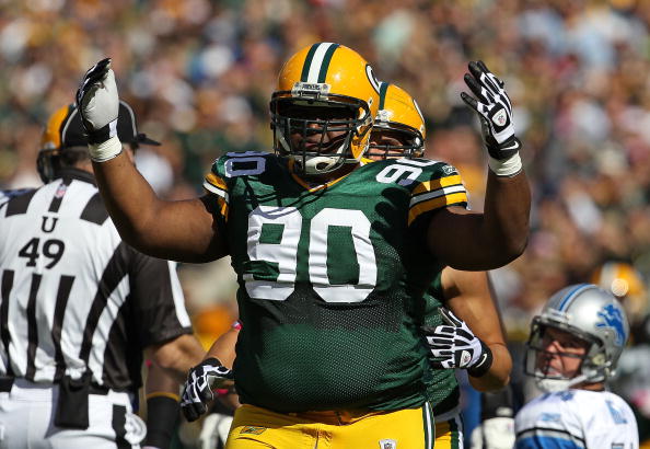 GREEN BAY, WI - OCTOBER 03: B.J. Raji #90 of the Green Bay Packers celebrates a defensive stop against the Detroit Lions at Lambeau Field on October 3, 2010 in Green Bay, Wisconsin. The Packers defeated the Lions 28-26. (Photo by Jonathan Daniel/Getty Ima