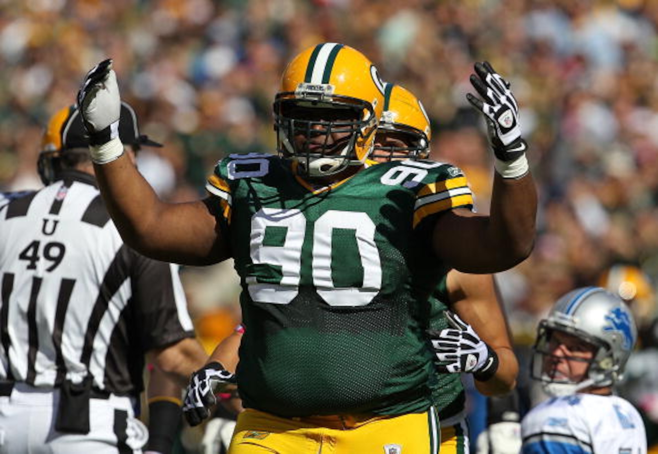 GREEN BAY, WI - OCTOBER 03: B.J. Raji #90 of the Green Bay Packers celebrates a defensive stop against the Detroit Lions at Lambeau Field on October 3, 2010 in Green Bay, Wisconsin. The Packers defeated the Lions 28-26. (Photo by Jonathan Daniel/Getty Ima GREEN BAY, WI - OCTOBER 03: B.J. Raji #90 of the Green Bay Packers celebrates a defensive stop against the Detroit Lions at Lambeau Field on October 3, 2010 in Green Bay, Wisconsin. The Packers defeated the Lions 28-26. (Photo by Jonathan Daniel/Getty Ima