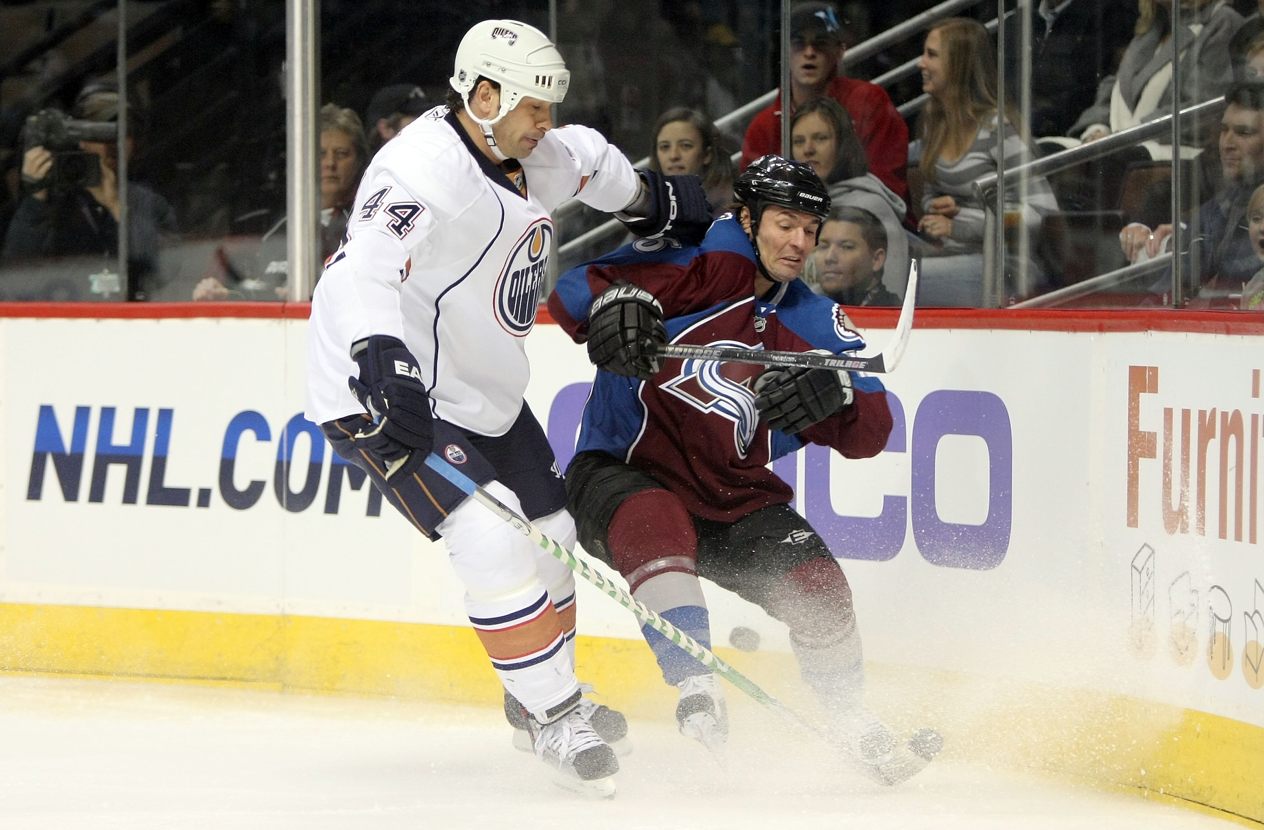 DENVER - JANUARY 18:  Darcy Tucker #16 of the Colorado Avalanche battles with Sheldon Souray #44 of the Edmonton Oilers for control of the puck during NHL action at the Pepsi Center on January 18, 2010 in Denver, Colorado. The Avalanche defeated the Oiler