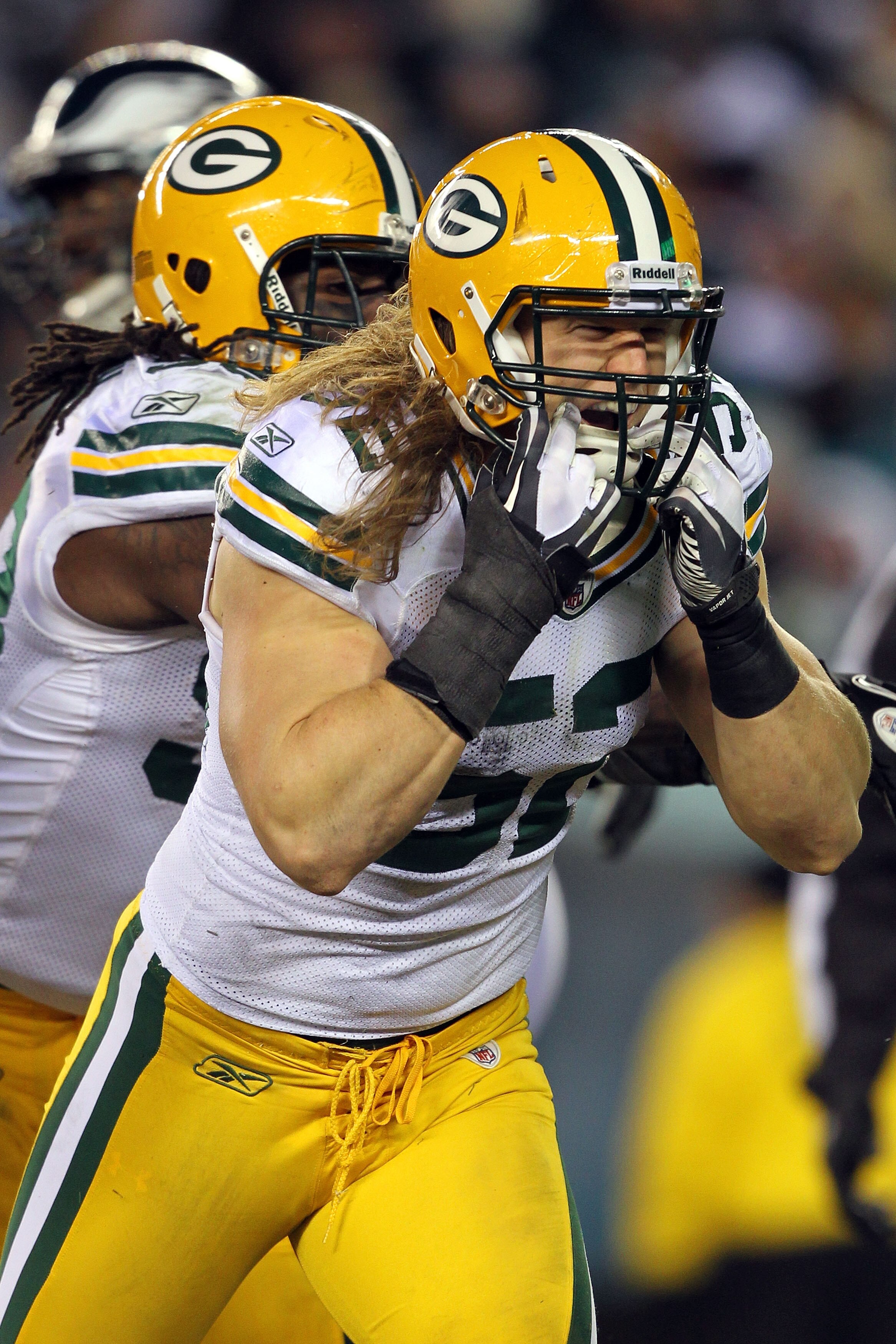 PHILADELPHIA, PA - JANUARY 09: Clay Matthews #52 of the Green Bay Packers celebrates after a sack against the Michael Vick #7 of the Philadelphia Eagles during the 2011 NFC wild card playoff game at Lincoln Financial Field on January 9, 2011 in Philadelp
