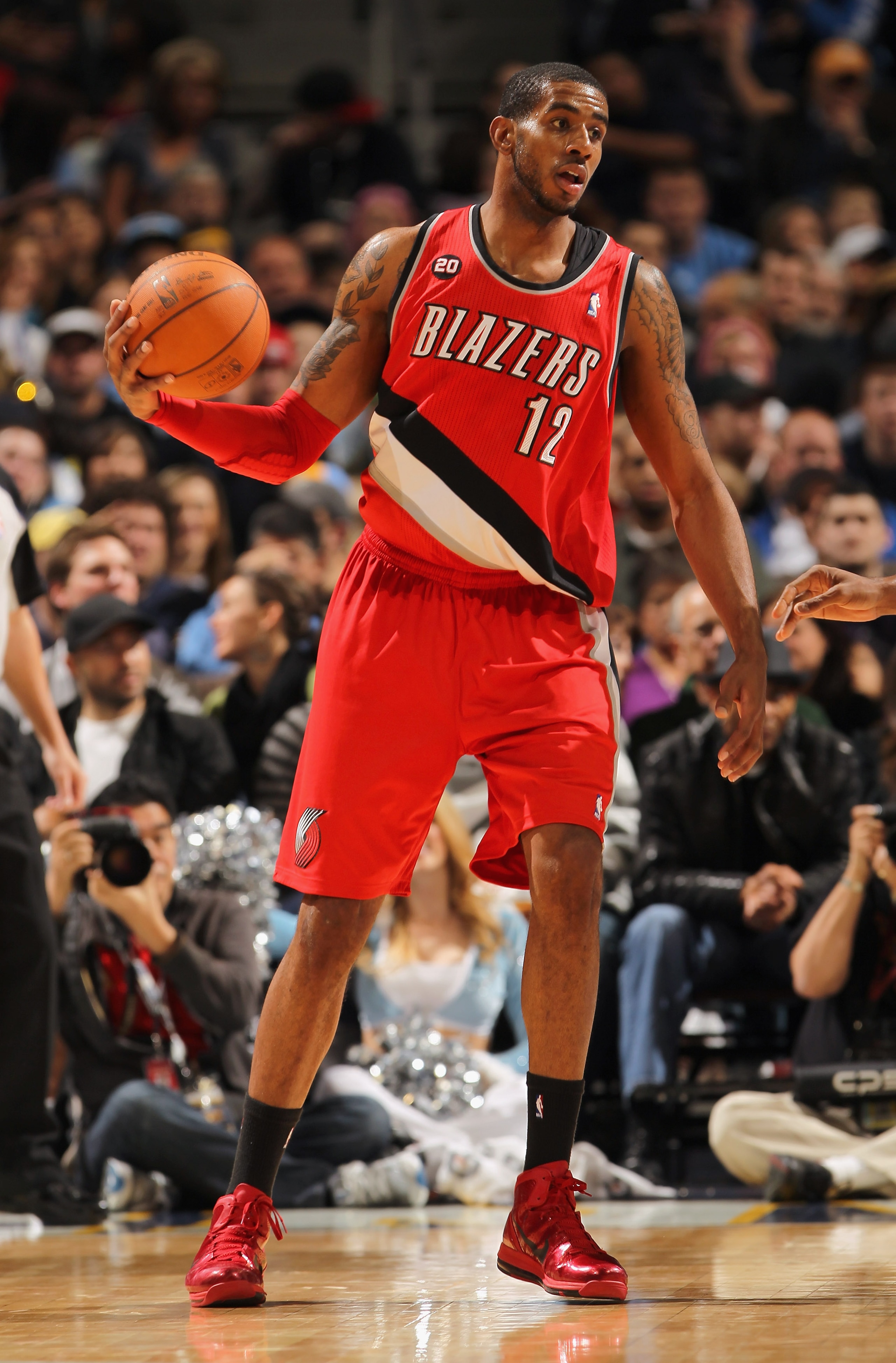 DENVER - DECEMBER 28:  LaMarcus Aldridge #12 of the Portland Trail Blazers controls the ball against the Denver Nuggets at Pepsi Center on December 28, 2010 in Denver, Colorado. The Nuggets defeated the Blazers 95-77. NOTE TO USER: User expressly acknowle