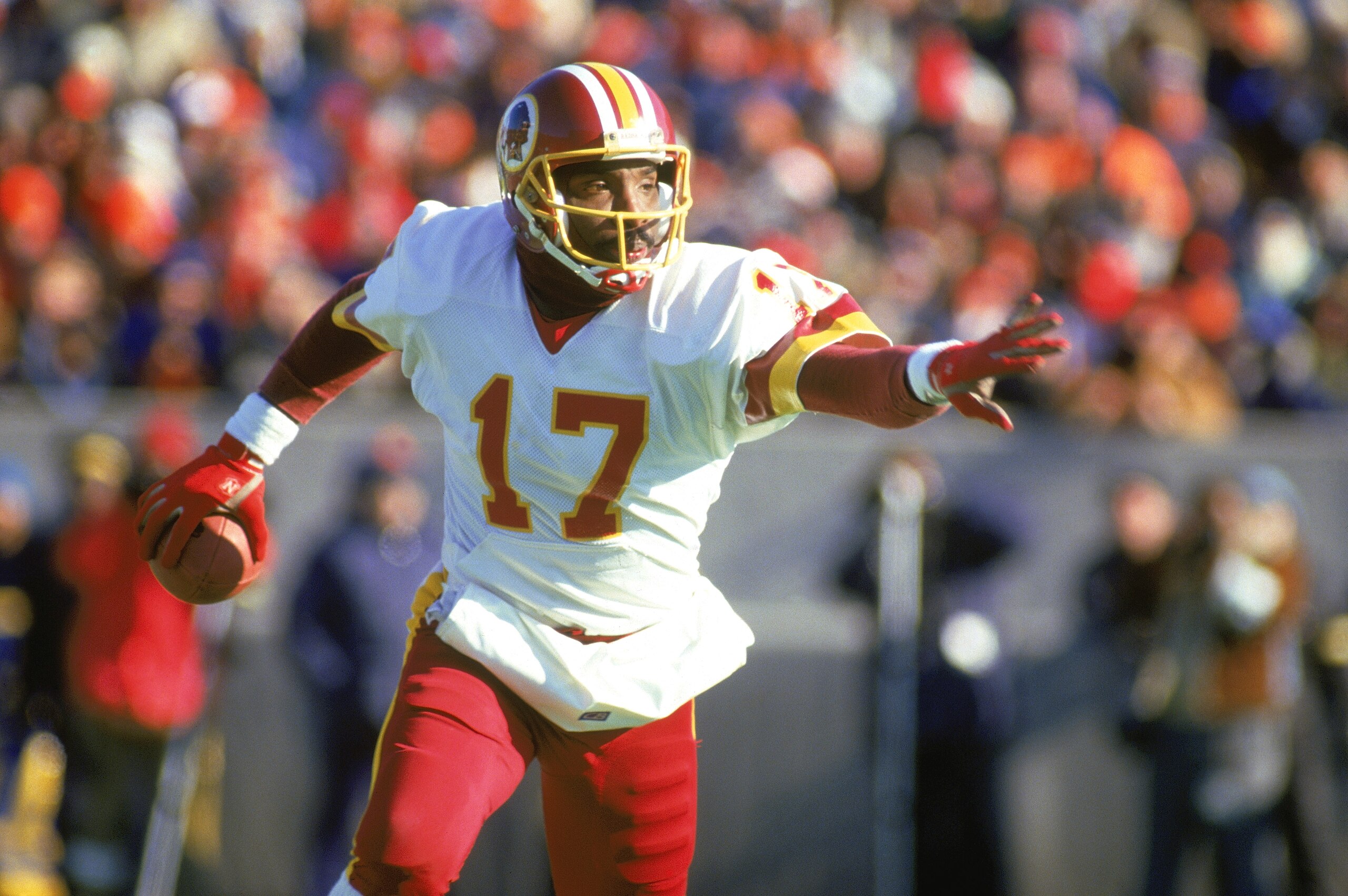 1987: Doug Williams #17 of the Washington Redskins scrambles with the ball during a 1987 NFL season game. (Photo by: Jonathan Daniel/Getty Images) 1987: Doug Williams #17 of the Washington Redskins scrambles with the ball during a 1987 NFL season game. (Photo by: Jonathan Daniel/Getty Images)
