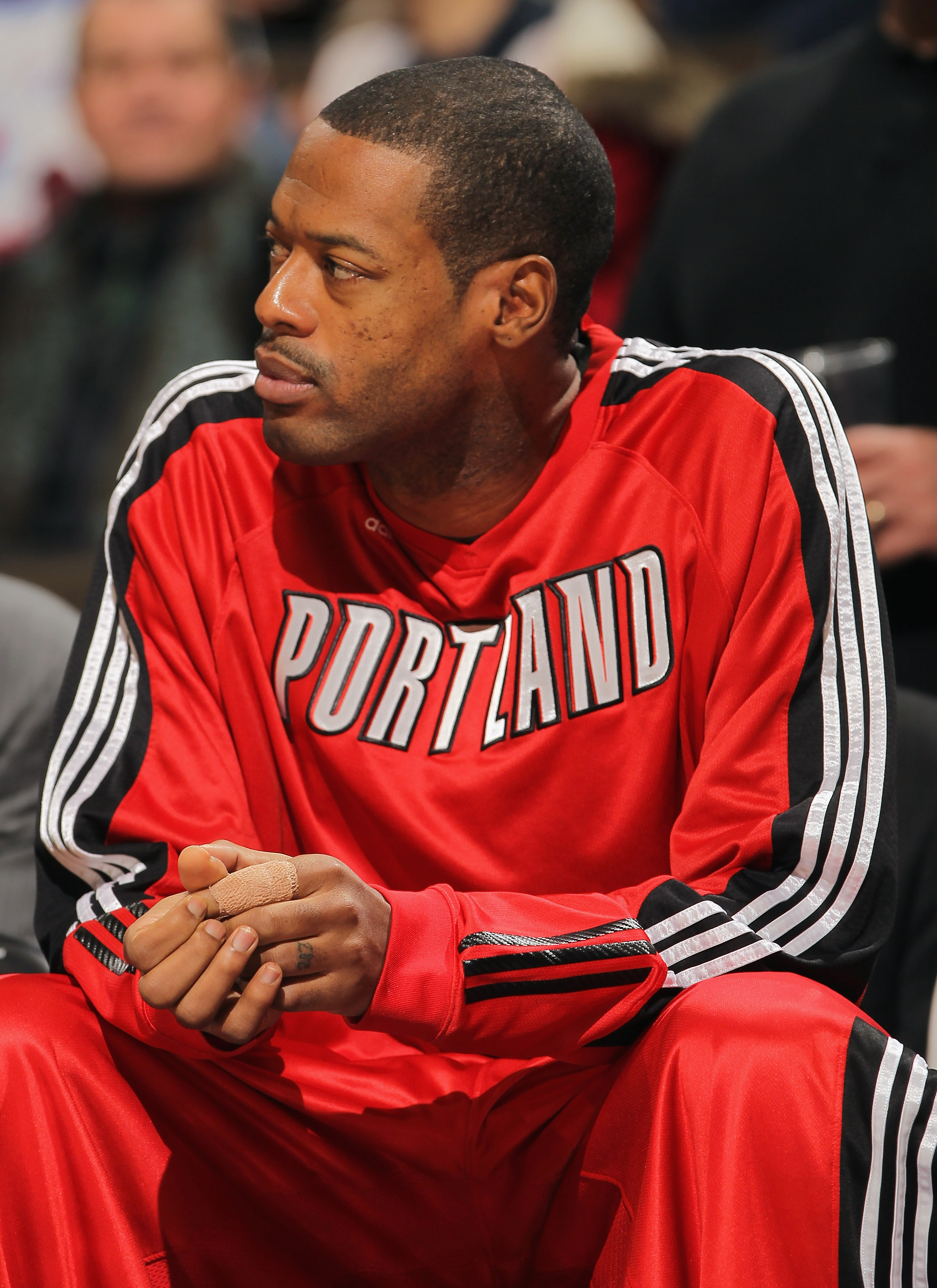 DENVER - DECEMBER 28:  Marcus Camby #23 of the Portland Trail Blazers sits out the game on the bench against the Denver Nuggets at Pepsi Center on December 28, 2010 in Denver, Colorado. The Nuggets defeated the Blazers 95-77. NOTE TO USER: User expressly