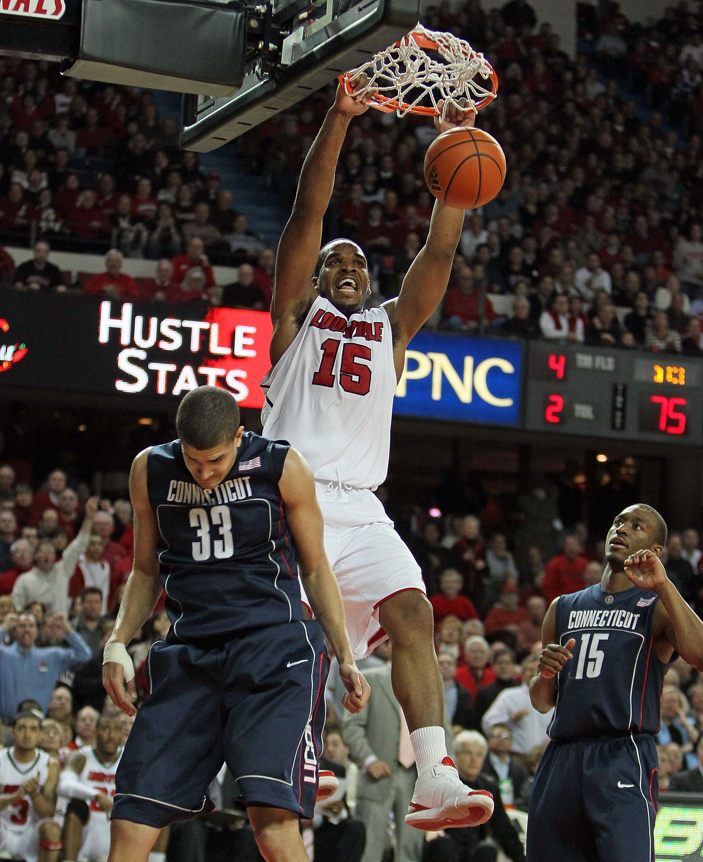 LOUISVILLE, KY - FEBRUARY 01: Samardo Samuels #15 of the Louisville Cardinals dunks the ball during the Big East Conference game against the Connecticut Huskies on February 1, 2010 at Freedom Hall in Louisville, Kentucky.  Louisville won 82-69.  (Photo by