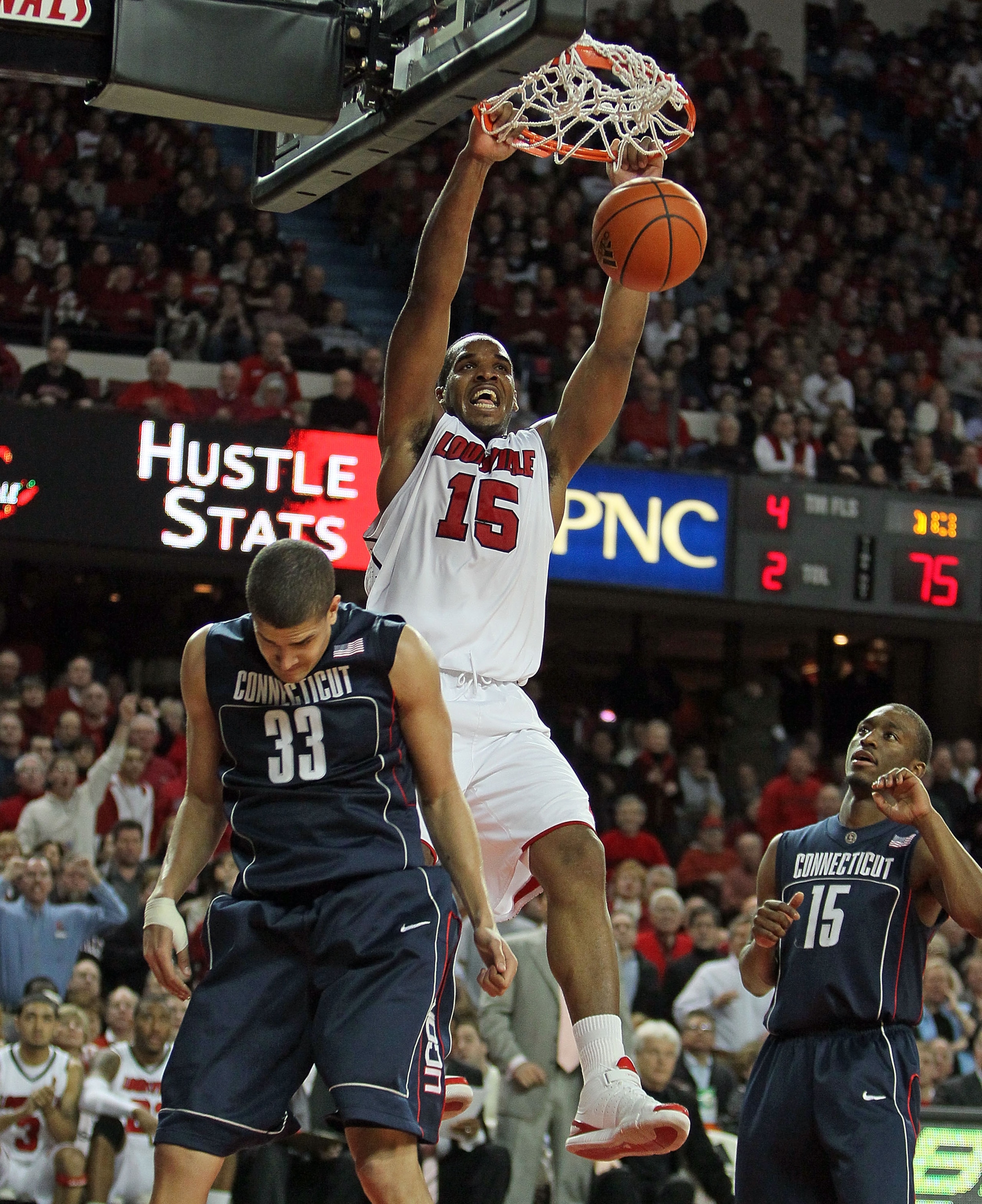 LOUISVILLE, KY - FEBRUARY 01: Samardo Samuels #15 of the Louisville Cardinals dunks the ball during the Big East Conference game against the Connecticut Huskies on February 1, 2010 at Freedom Hall in Louisville, Kentucky.  Louisville won 82-69.  (Photo by