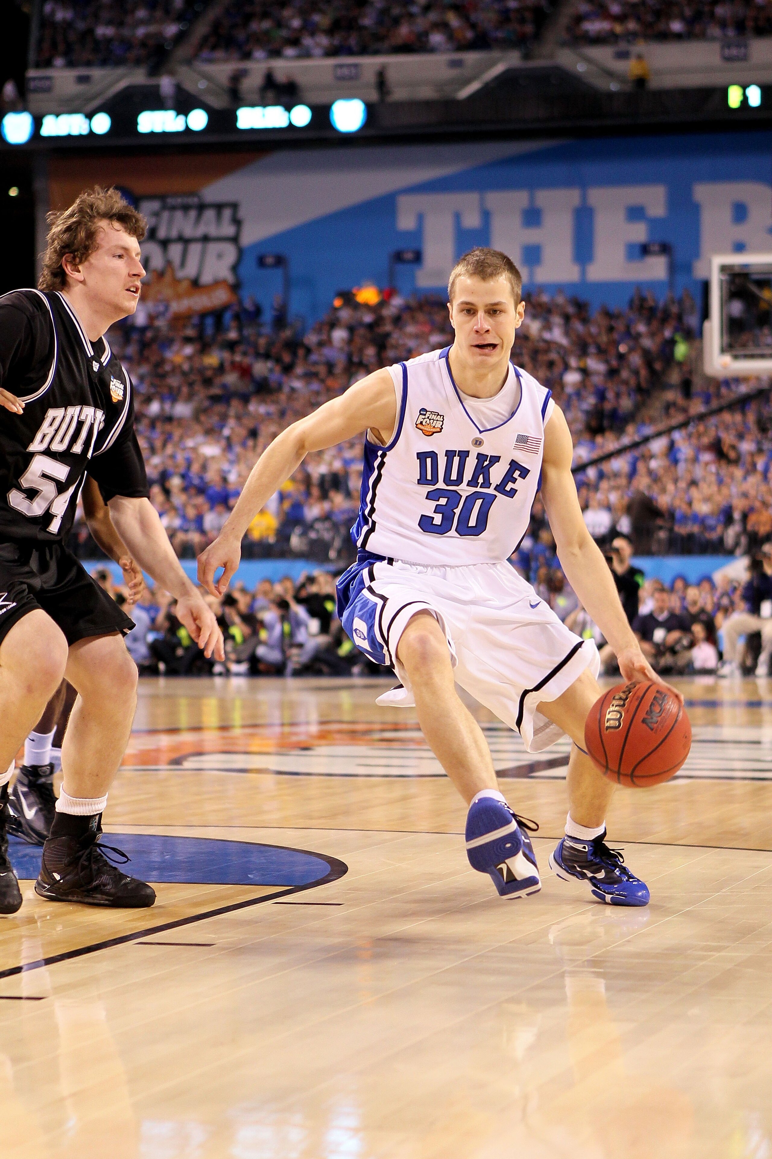 INDIANAPOLIS - APRIL 05:  Jon Scheyer #30 of the Duke Blue Devils drives against the Butler Bulldogs during the 2010 NCAA Division I Men's Basketball National Championship game at Lucas Oil Stadium on April 5, 2010 in Indianapolis, Indiana.  (Photo by And