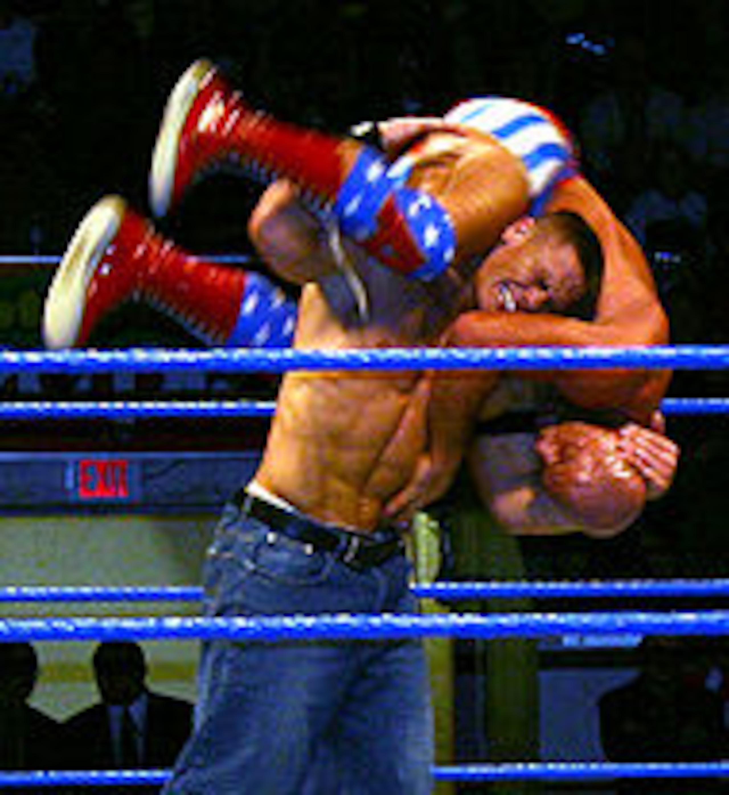 That is John Cena giving Kurt Angle an "Attitude Ajustment"