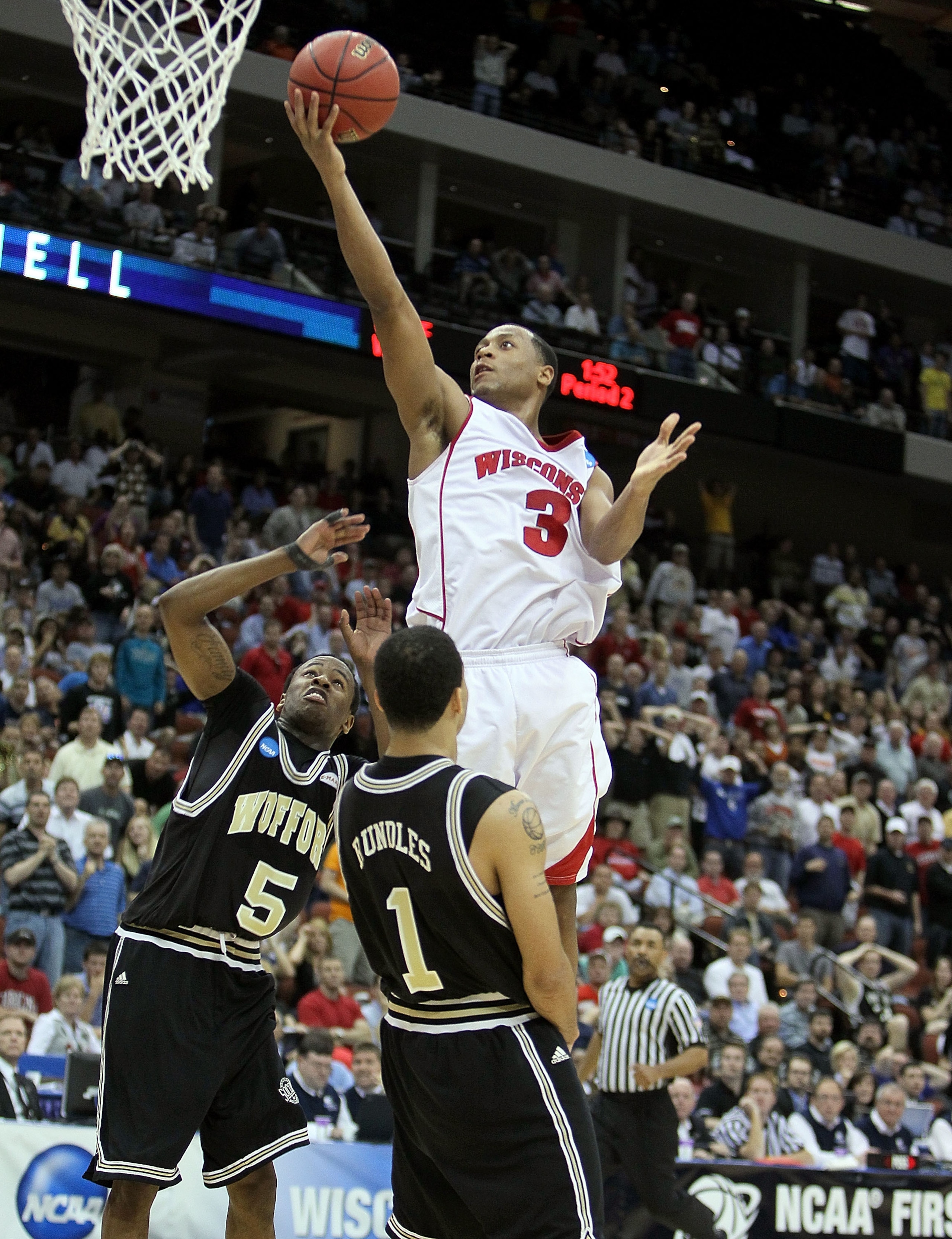JACKSONVILLE, FL - MARCH 19:  Trevon Hughes #3 of the Wisconsin Badgers shoots the ball against the Wofford Terriers during the first round of the 2010 NCAA men's basketball tournament at Jacksonville Veteran's Memorial Arena on March 19, 2010 in Jacksonv