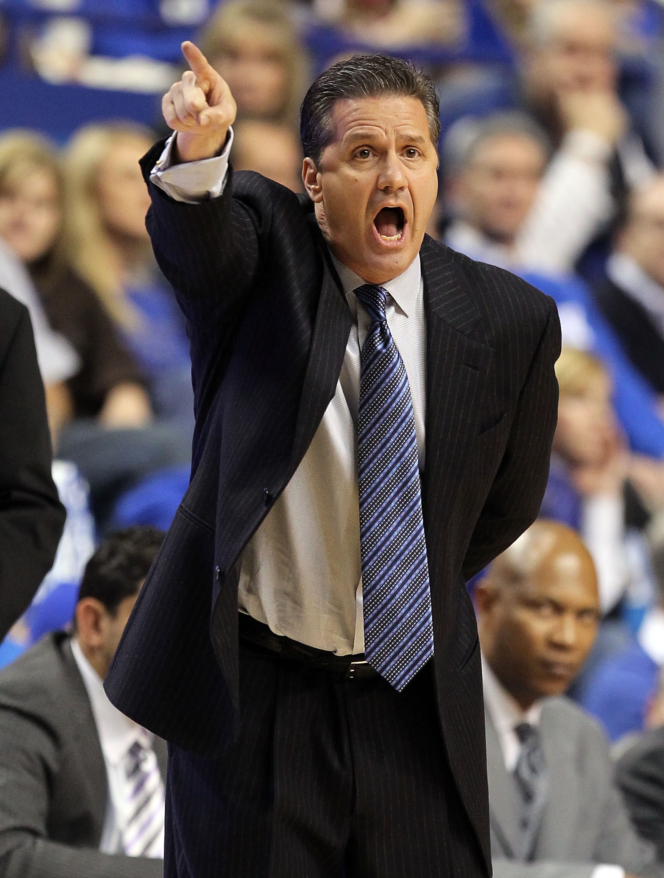 LEXINGTON, KY - JANUARY 03:  John Calipari the Head Coach of the Kentucky Wildcats gives instructions to his team during the game against the Penn Quakers at Rupp Arena on January 3, 2011 in Lexington, Kentucky.  Kentucky won 86-62.  (Photo by Andy Lyons/