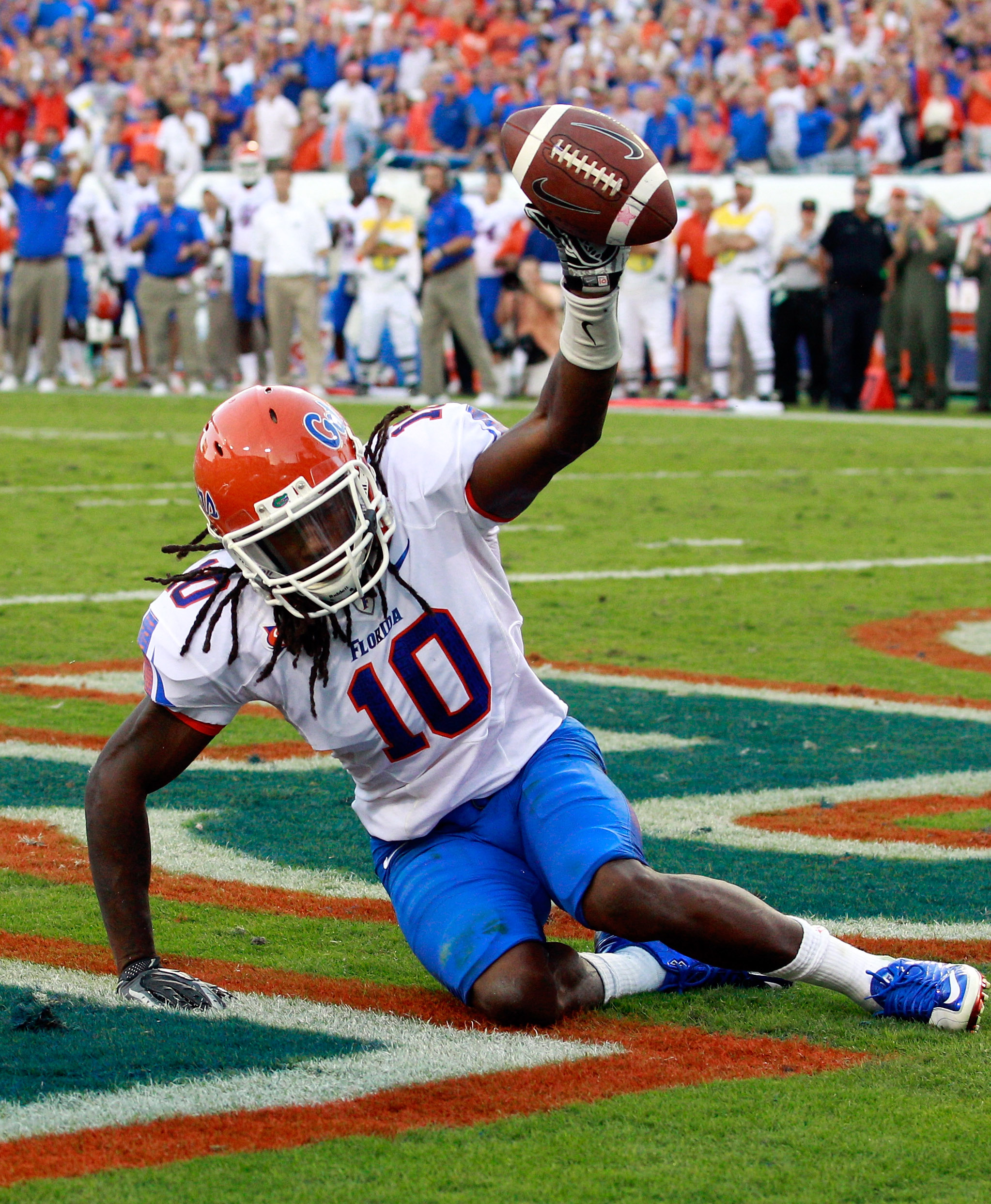 JACKSONVILLE, FL - OCTOBER 30:  Will Hill #10 of the Florida Gators holds up the ball after an interception during the game against the Georgia Bulldogs at EverBank Field on October 30, 2010 in Jacksonville, Florida.  (Photo by Sam Greenwood/Getty Images)
