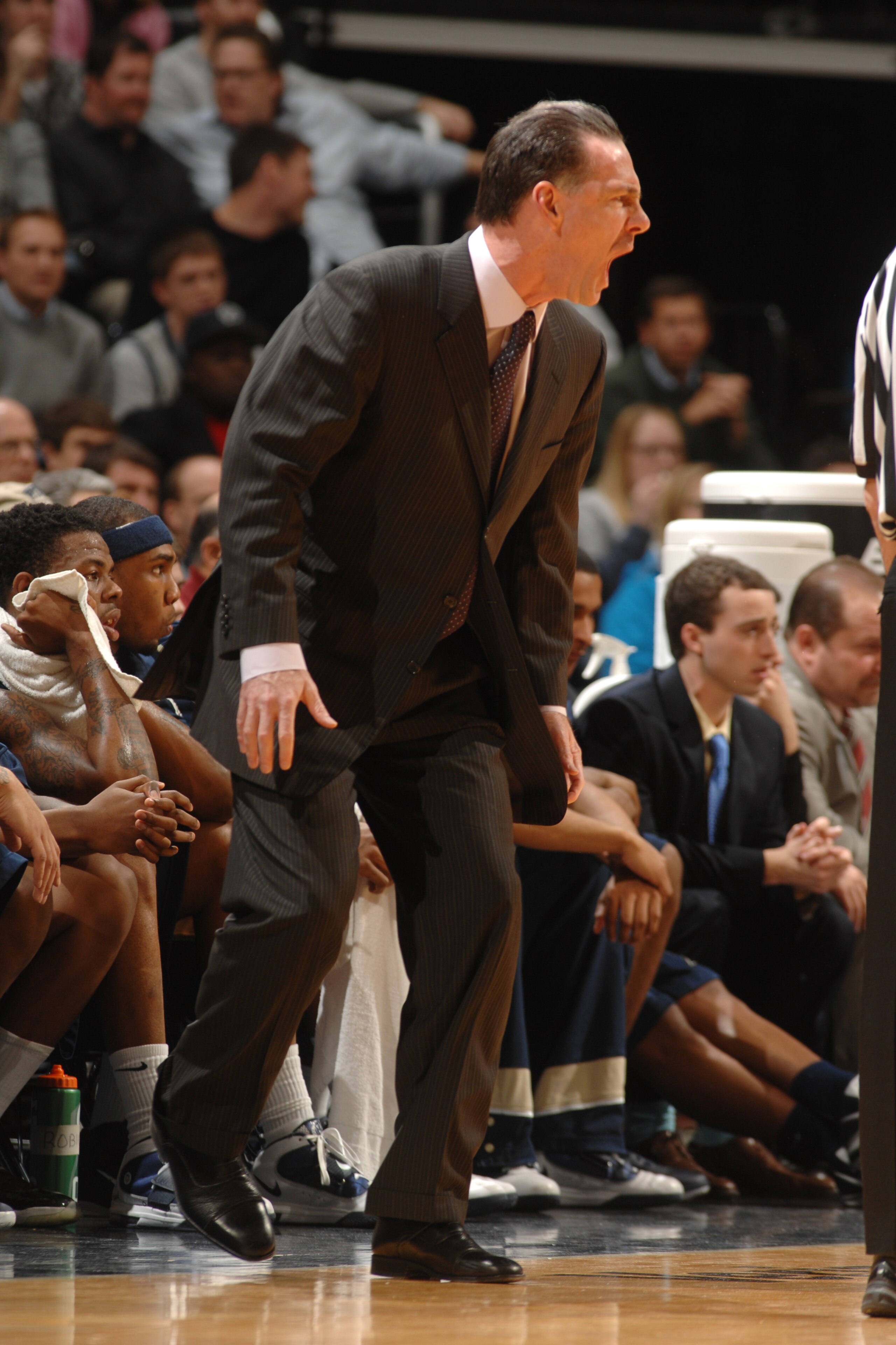 WASHINGTON, DC- JANUARY 12: Head coach Jamie Dixon of the Pittsburgh Panthers reacts to play during a college basketball game against the Georgetown Hoyas on January 12, 2011 at the Verizon Center in Washington, DC. The Panthers won 72-57. (Photo by Mi WASHINGTON, DC- JANUARY 12: Head coach Jamie Dixon of the Pittsburgh Panthers reacts to play during a college basketball game against the Georgetown Hoyas on January 12, 2011 at the Verizon Center in Washington, DC. The Panthers won 72-57. (Photo by Mi