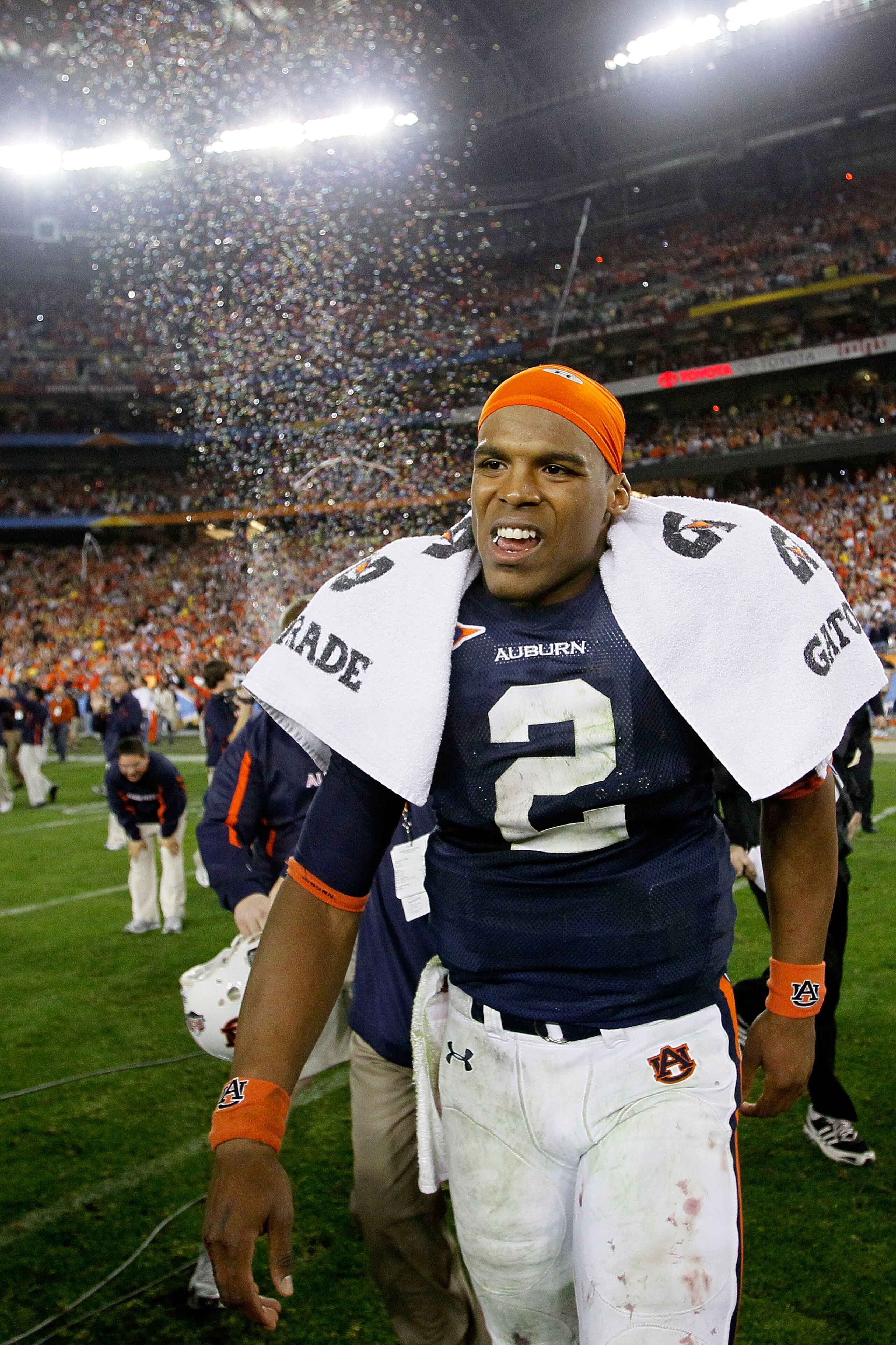 GLENDALE, AZ - JANUARY 10:  Quarterback Cameron Newton #2 of the Auburn Tigers celebrates the Tigers 22-19 victory against the Oregon Ducks in the Tostitos BCS National Championship Game at University of Phoenix Stadium on January 10, 2011 in Glendale, Ar