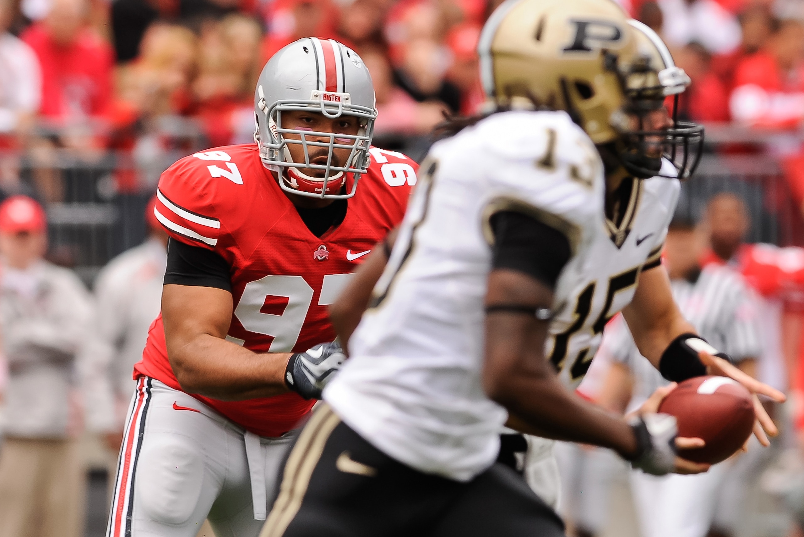 COLUMBUS, OH - OCTOBER 23:  Cameron Heyward #97 of the Ohio State Buckeyes chases after a Purdue Boilermaker ballcarrier at Ohio Stadium on October 23, 2010 in Columbus, Ohio.  (Photo by Jamie Sabau/Getty Images)