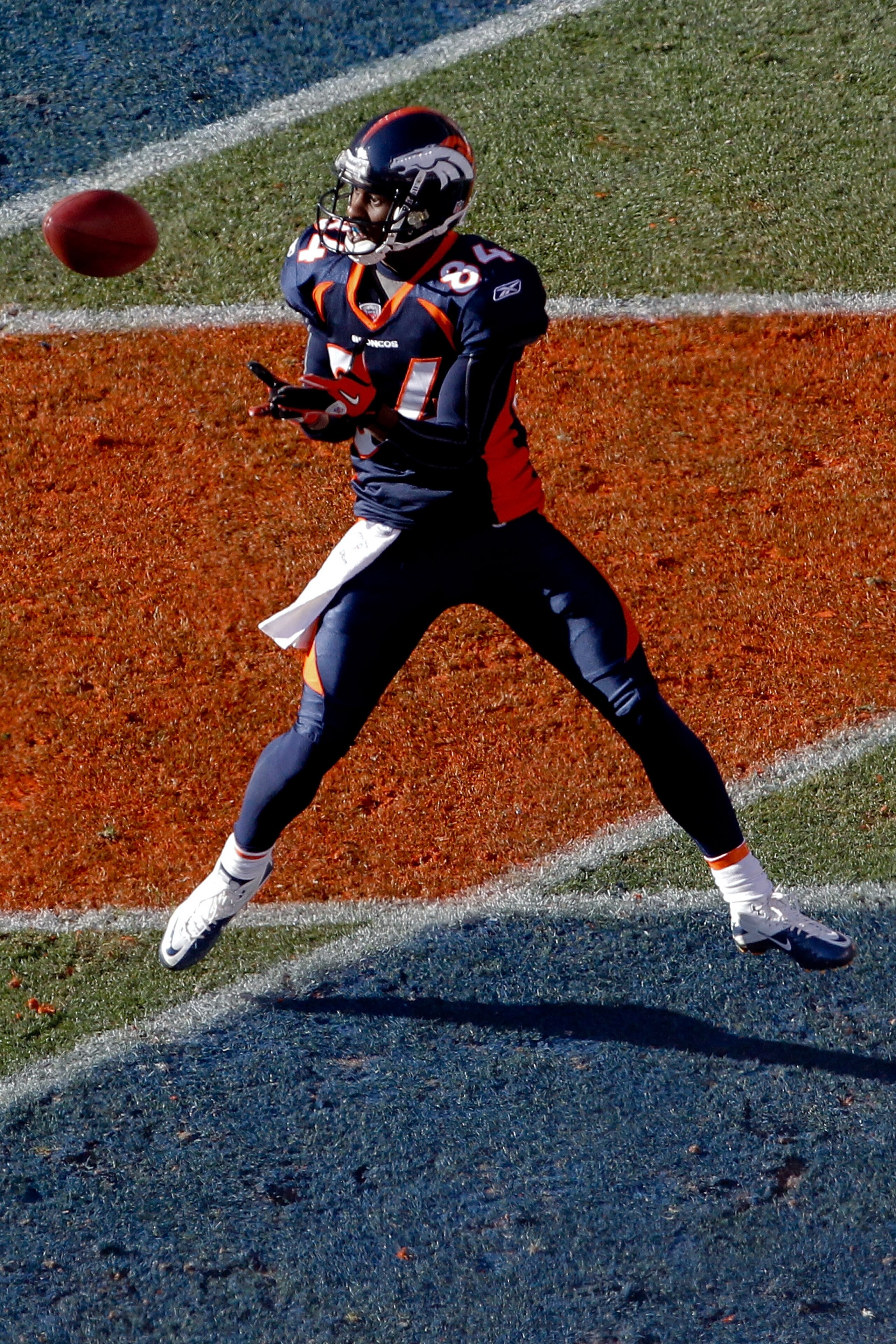 DENVER, CO - JANUARY 2:  Wide receiver Brandon Lloyd #84 of the Denver Broncos makes a touchdown reception against the San Diego Chargers during the first quarter at INVESCO Field at Mile High on January 2, 2011 in Denver, Colorado. (Photo by Justin Edmon