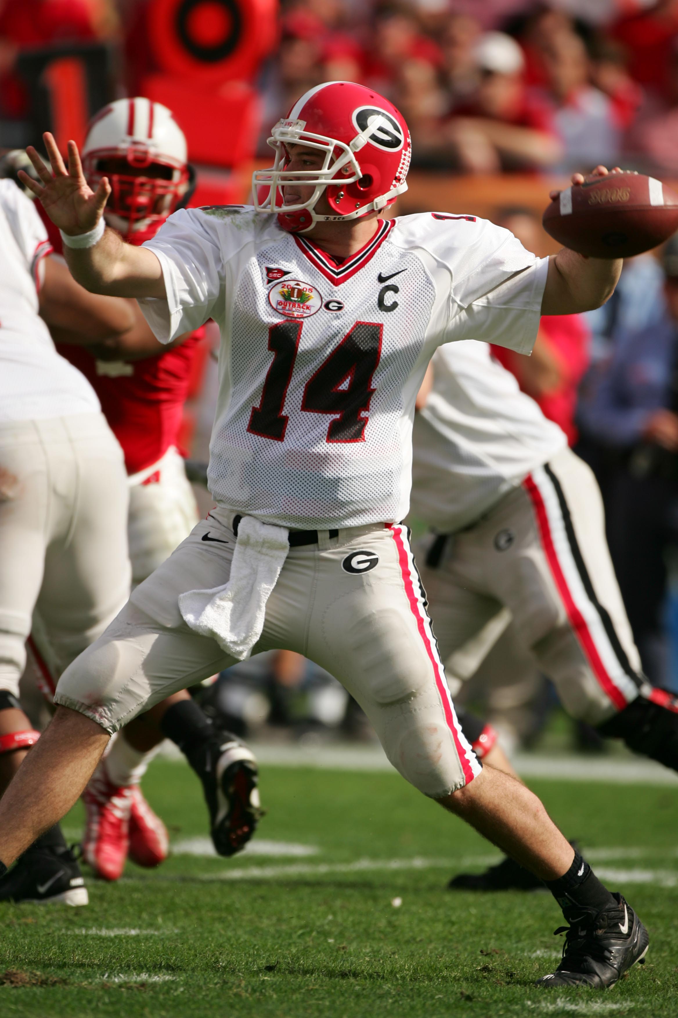 TAMPA, FL-  JANUARY 1:  David Greene #14 of the Georgia Bulldogs passes during the Outback Bowl game against the Wisconsin Badgers at Raymond James Stadium on January 1, 2005 in Tampa, Florida. Georgia won the game 24-21. (Photo by Scott Halleran/Getty Im
