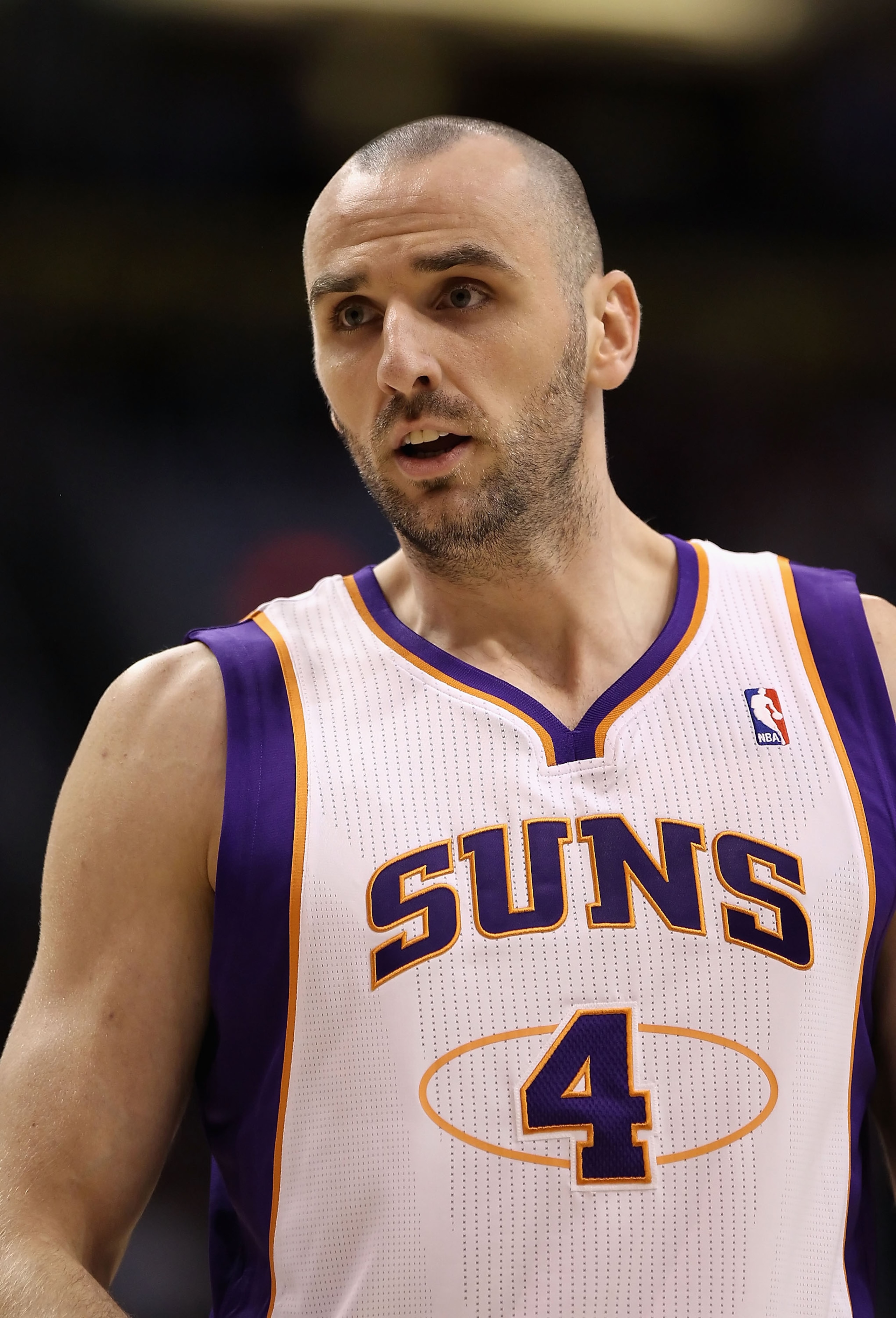 PHOENIX - DECEMBER 23:  Marcin Gortat #4 of the Phoenix Suns during the NBA game against the Miami Heat at US Airways Center on December 23, 2010 in Phoenix, Arizona.  The Heat defeated the Suns 95-83.  NOTE TO USER: User expressly acknowledges and agrees