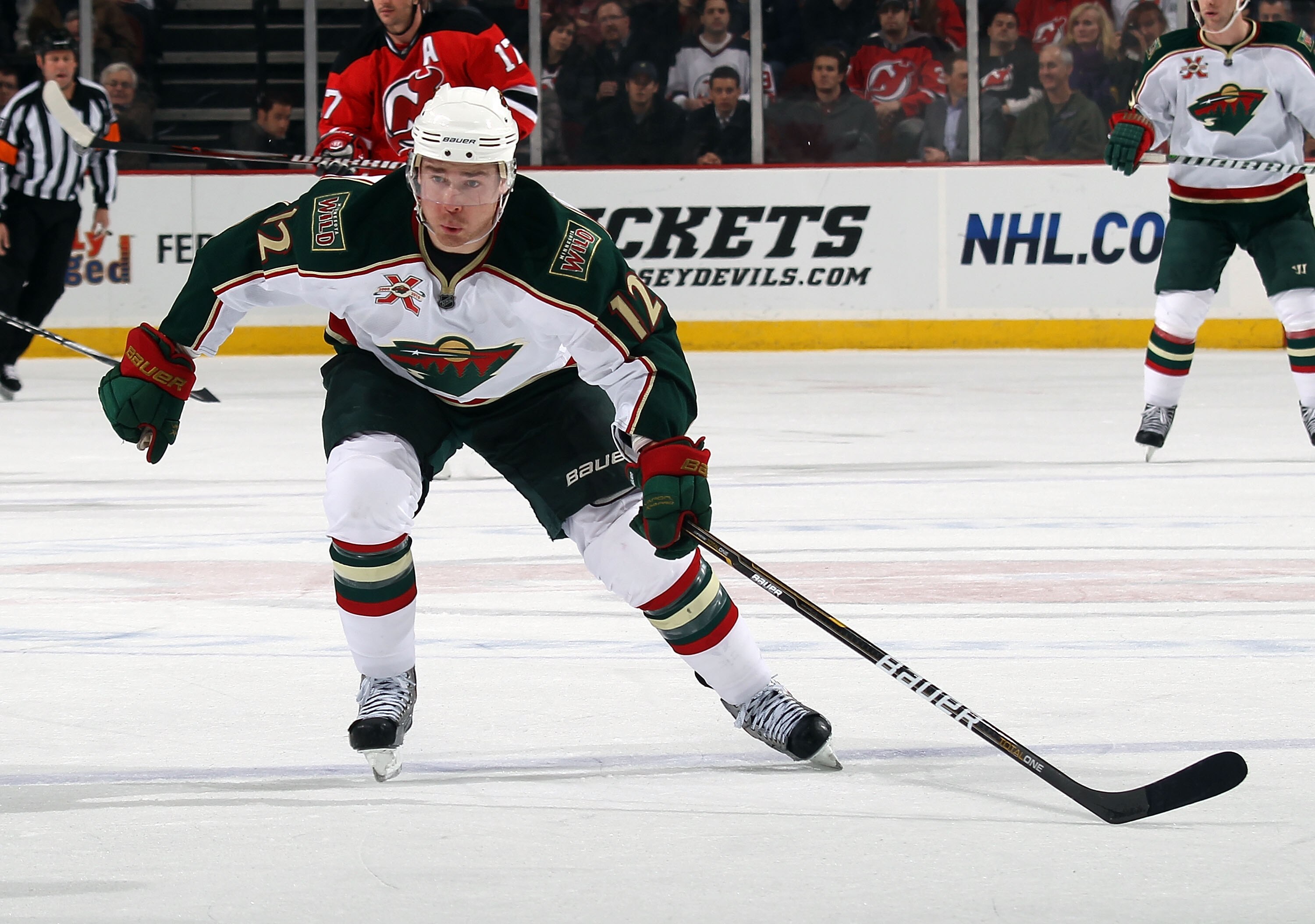 NEWARK, NJ - JANUARY 04:  Chuck Kobasew #12 of the Minnesota Wild skates against the New Jersey Devils at the Prudential Center on January 4, 2011 in Newark, New Jersey. The Wild defeated the Devils 2-1.  (Photo by Bruce Bennett/Getty Images)