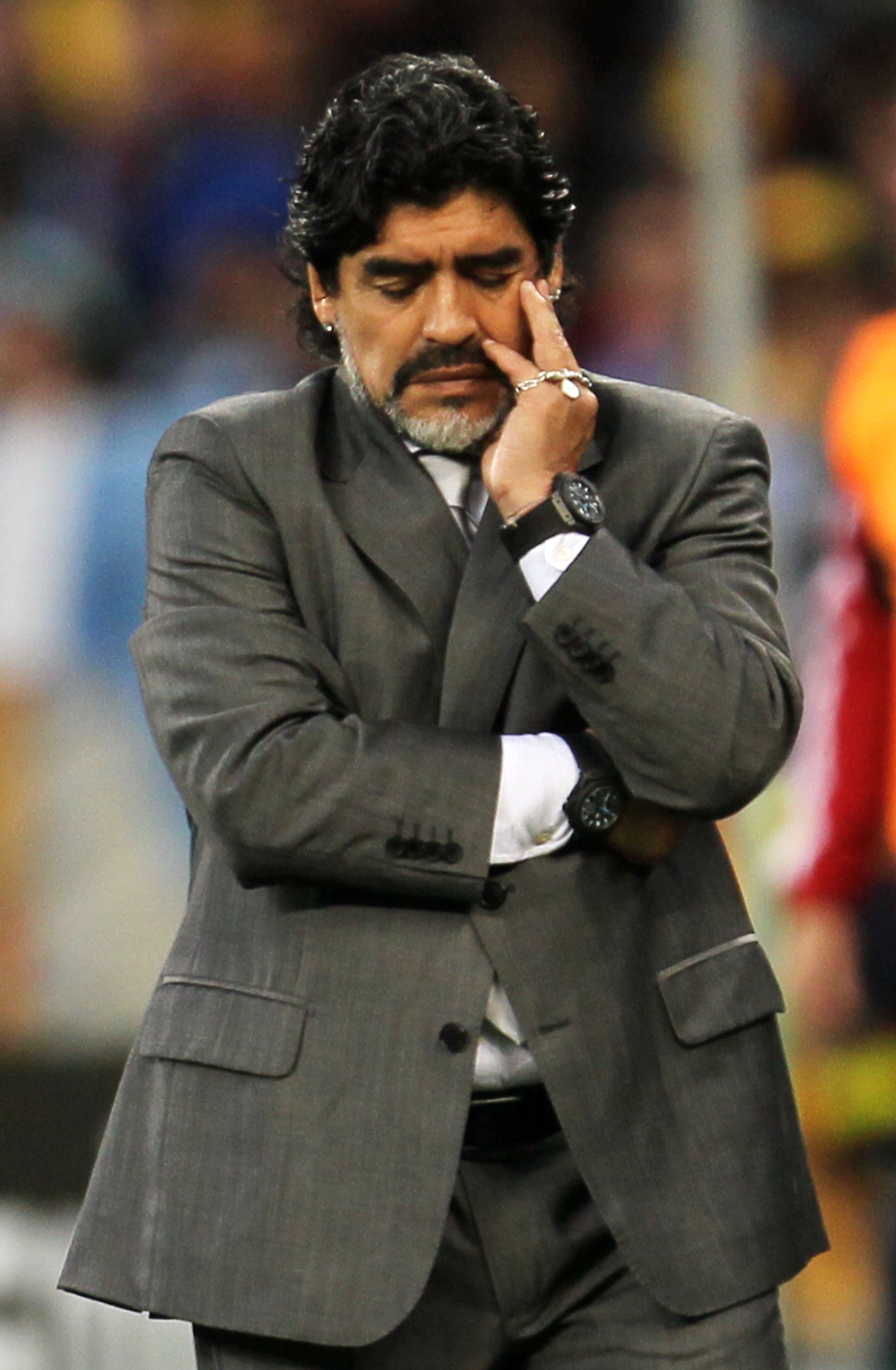 CAPE TOWN, SOUTH AFRICA - JULY 03:  Diego Maradona head coach of Argentina shows his dejection as he suffers a massive defeat in the 2010 FIFA World Cup South Africa Quarter Final match between Argentina and Germany at Green Point Stadium on July 3, 2010
