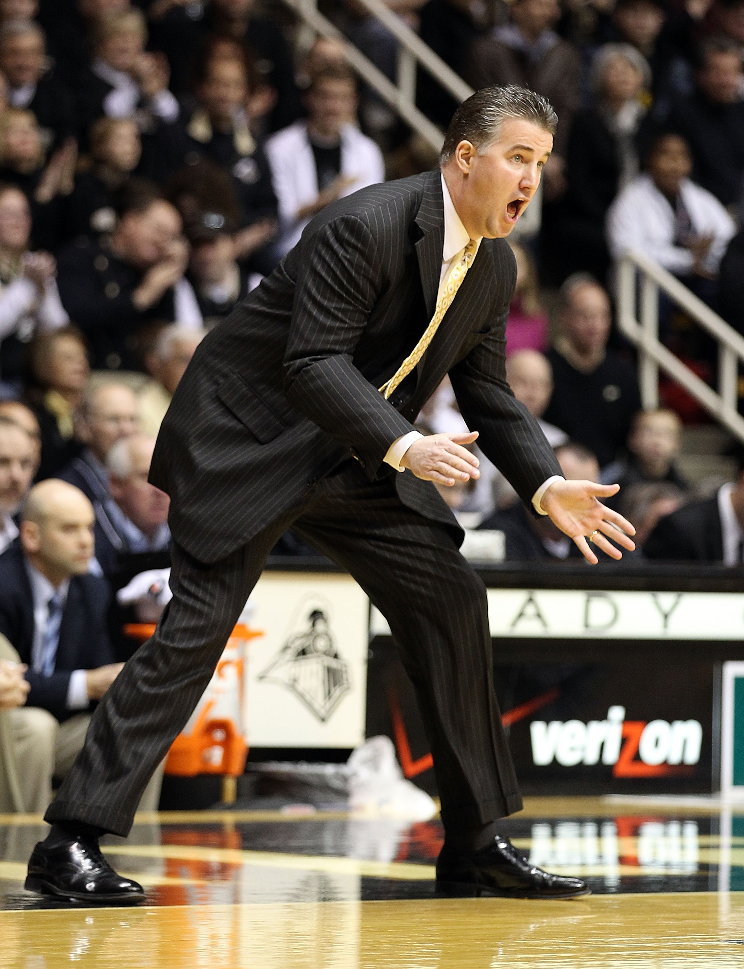 WEST LAFAYETTE, IN - JANUARY 09: Matt Painter the Head Coach of the Purdue Boilermakers gives instructions to his team during the Big Ten Conference game against the Iowa Hawkeyes at Mackey Arena on January 9, 2011 in West Lafayette, Indiana. Purdue won WEST LAFAYETTE, IN - JANUARY 09: Matt Painter the Head Coach of the Purdue Boilermakers gives instructions to his team during the Big Ten Conference game against the Iowa Hawkeyes at Mackey Arena on January 9, 2011 in West Lafayette, Indiana. Purdue won