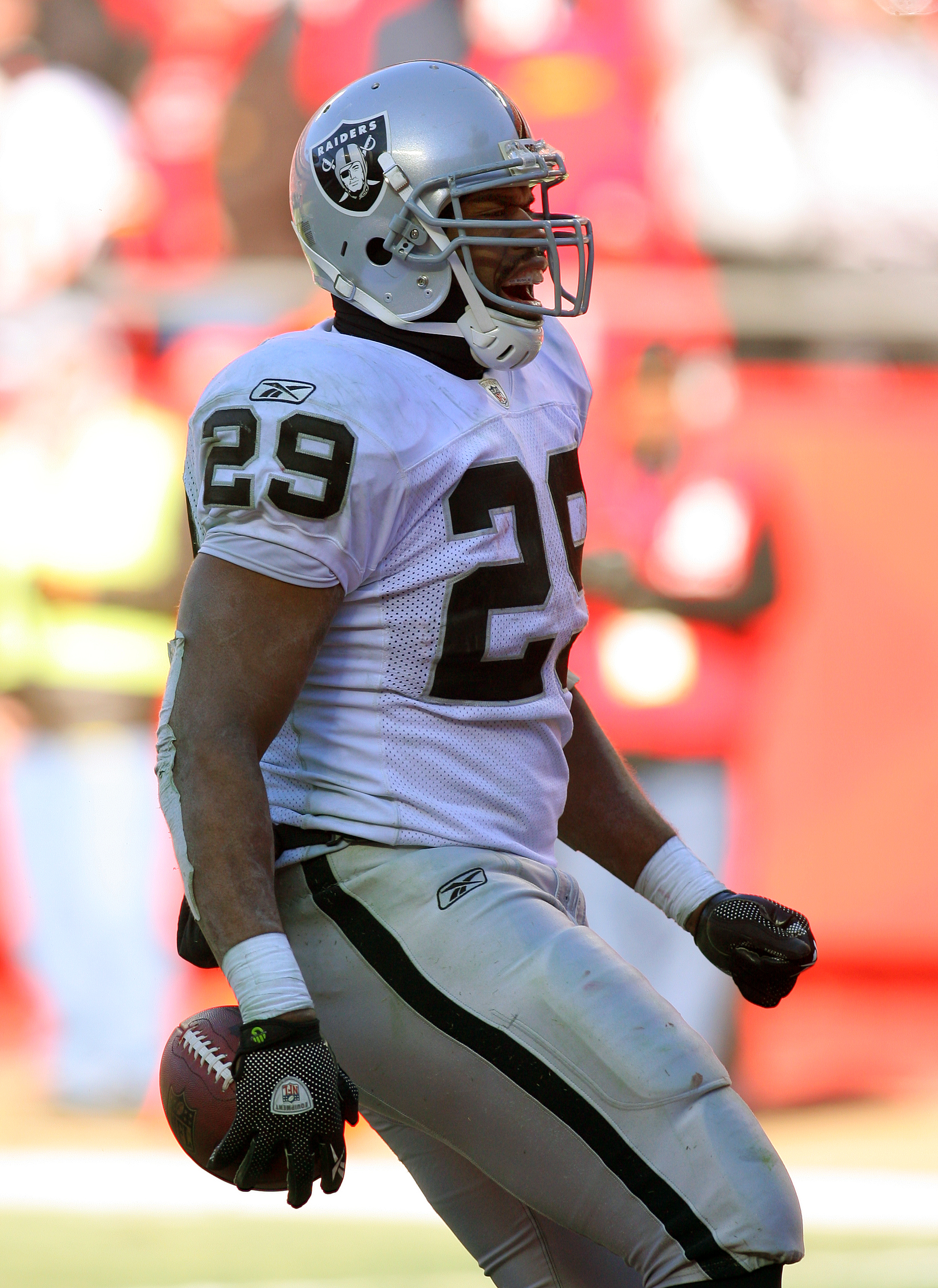 KANSAS CITY, MO - JANUARY 02:  Running back Michael Bush #29 of the Oakland Raiders celebrates after scoring a touchdown in a game against the Kansas City Chiefs at Arrowhead Stadium on January 2, 2011 in Kansas City, Missouri.  (Photo by Tim Umphrey/Gett