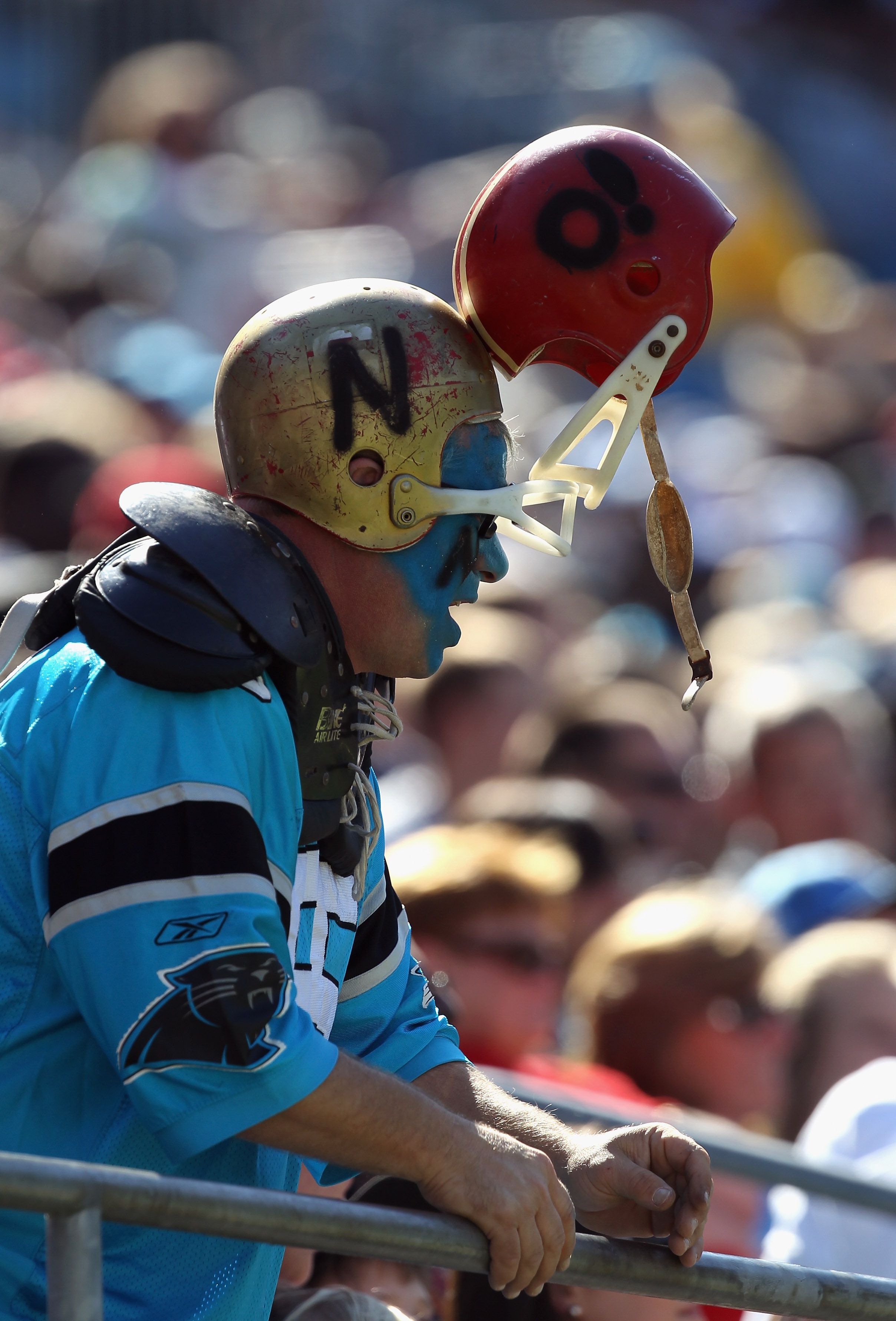 CHARLOTTE, NC - OCTOBER 24:  A fan wears a helmet to helmet hat due to the recent concerns in the NFL involving bad tackles during the San Francisco 49ers versus Carolina Panthers during their game at Bank of America Stadium on October 24, 2010 in Charlot