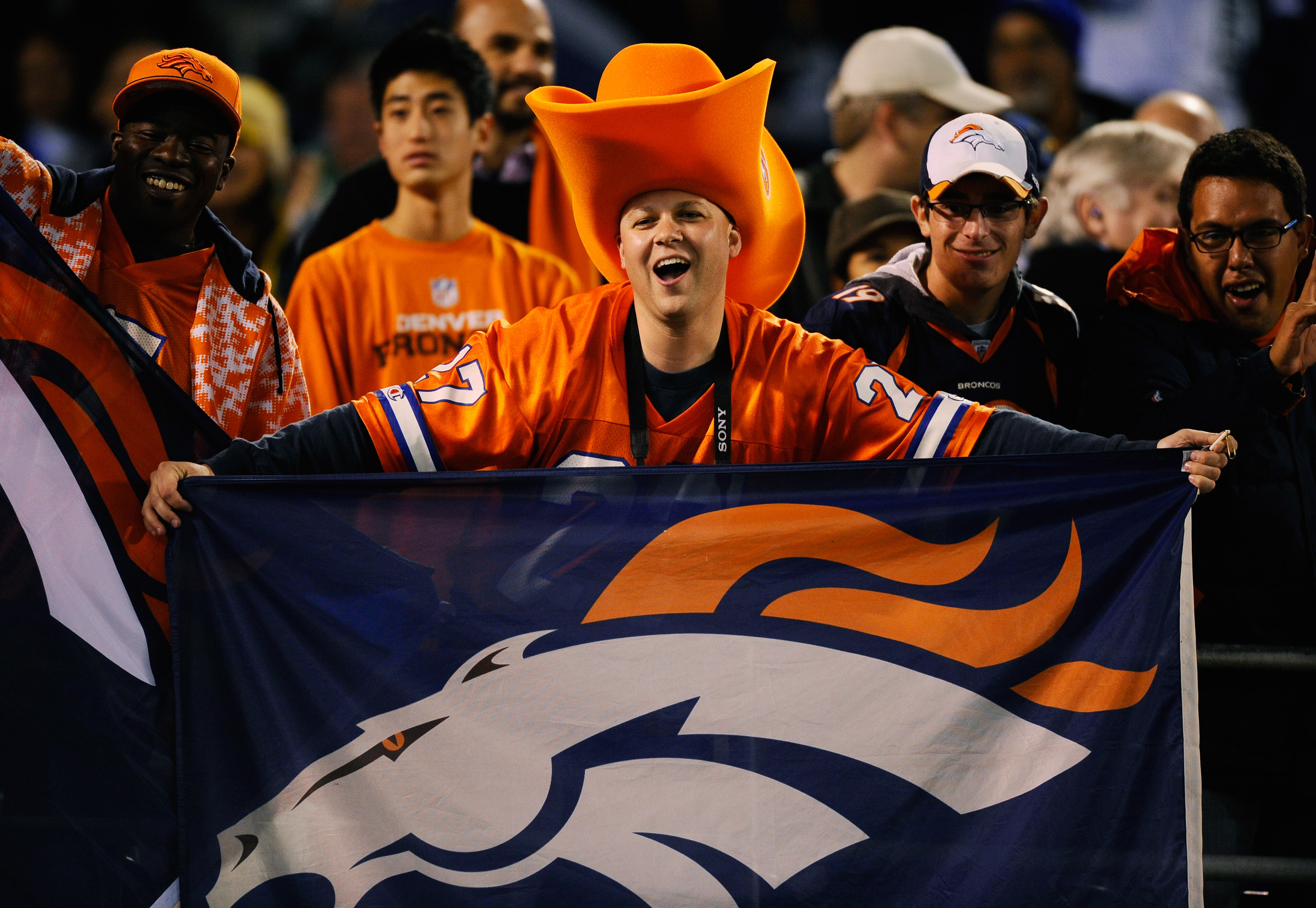 SAN DIEGO - NOVEMBER 22:  A Denver Bronco fan cheers during the NFL football game against  San Diego Chargers at Qualcomm Stadium on November 22, 2010 in San Diego, California.  (Photo by Kevork Djansezian/Getty Images)