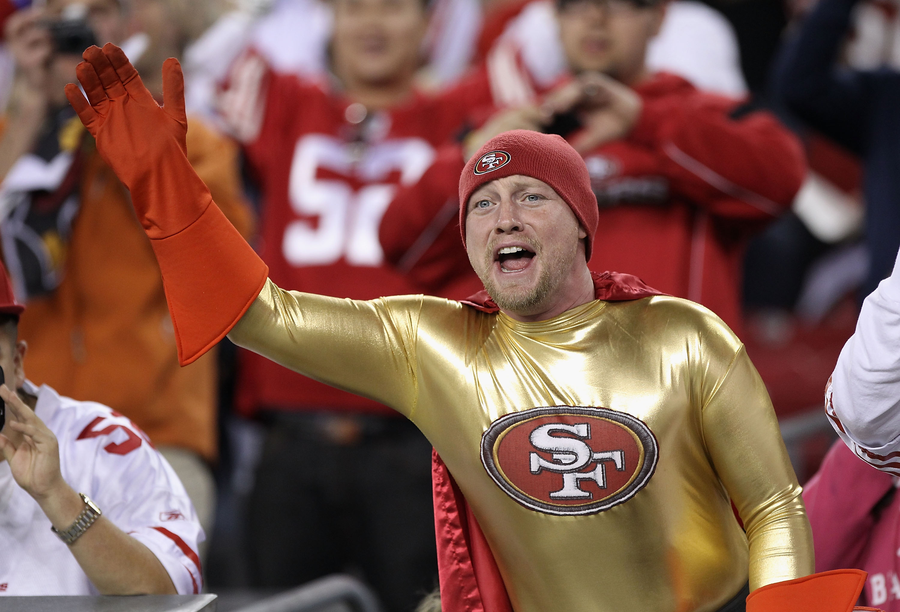 GLENDALE, AZ - NOVEMBER 29:  A fan of the San Francisco 49ers waves during the NFL game against the Arizona Cardinals at the University of Phoenix Stadium on November 29, 2010 in Glendale, Arizona.  (Photo by Christian Petersen/Getty Images)