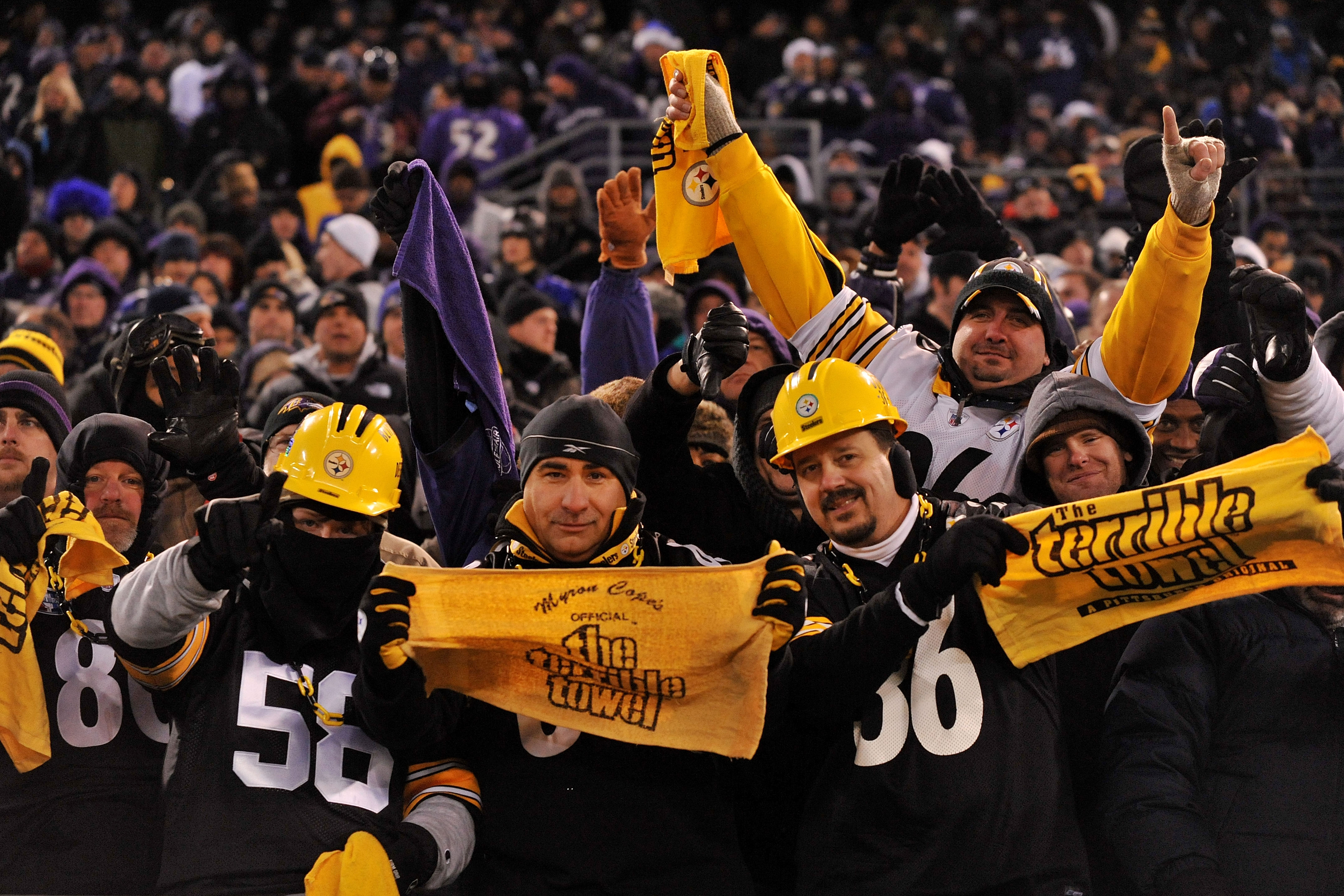 BALTIMORE, MD - DECEMBER 05:  Fans of the the Pittsburgh Steelers cheer during the game against the Baltimore Ravens at M&T Bank Stadium on December 5, 2010 in Baltimore, Maryland. Pittsburgh won 13-10.  (Photo by Larry French/Getty Images)