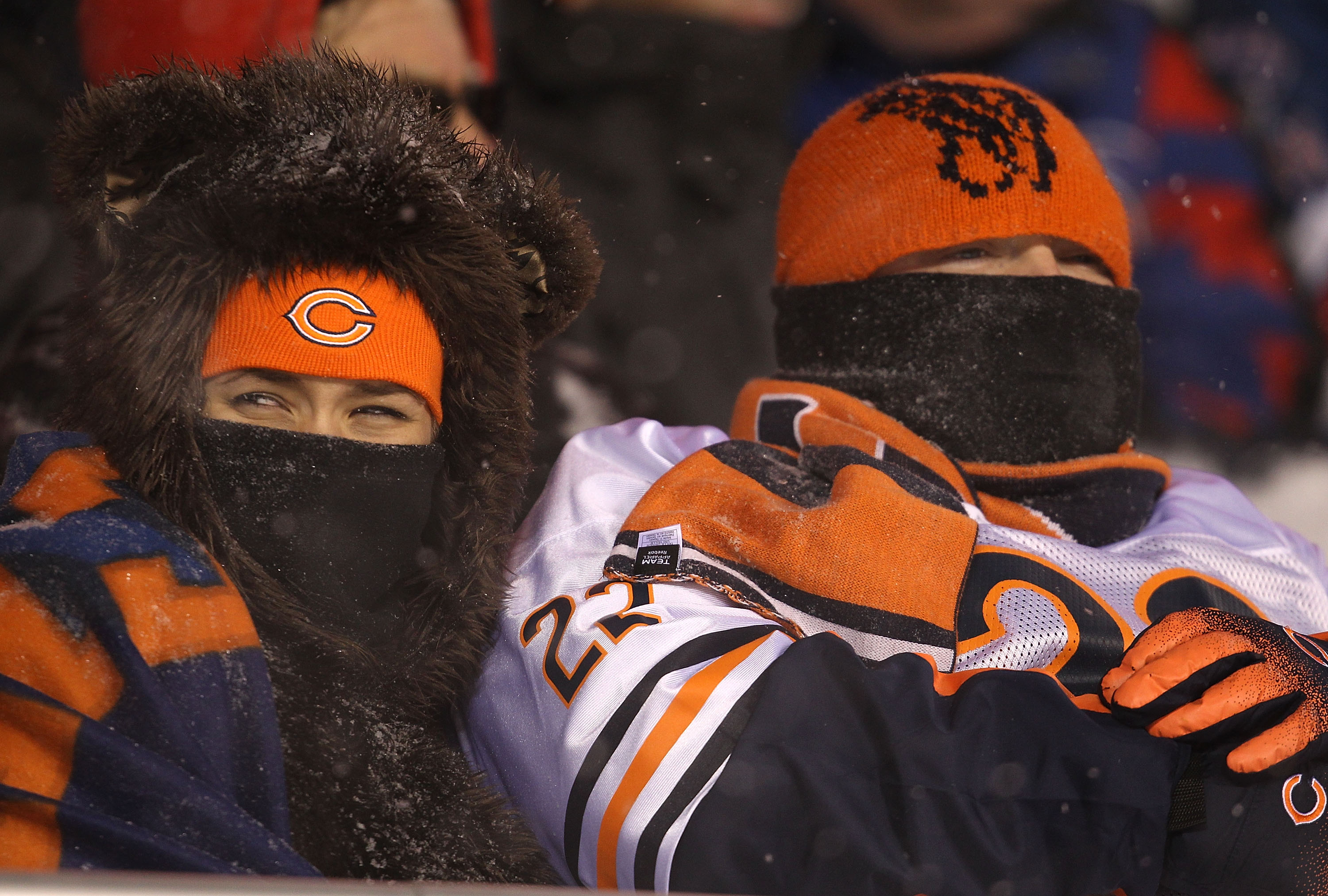 CHICAGO - DECEMBER 12: Fans of the Chicago Bears try to stay warm as they watch the Bears take on the New England Patriots at Soldier Field on December 12, 2010 in Chicago, Illinois. The Patriots defeated the Bears 36-7. (Photo by Jonathan Daniel/Getty Im
