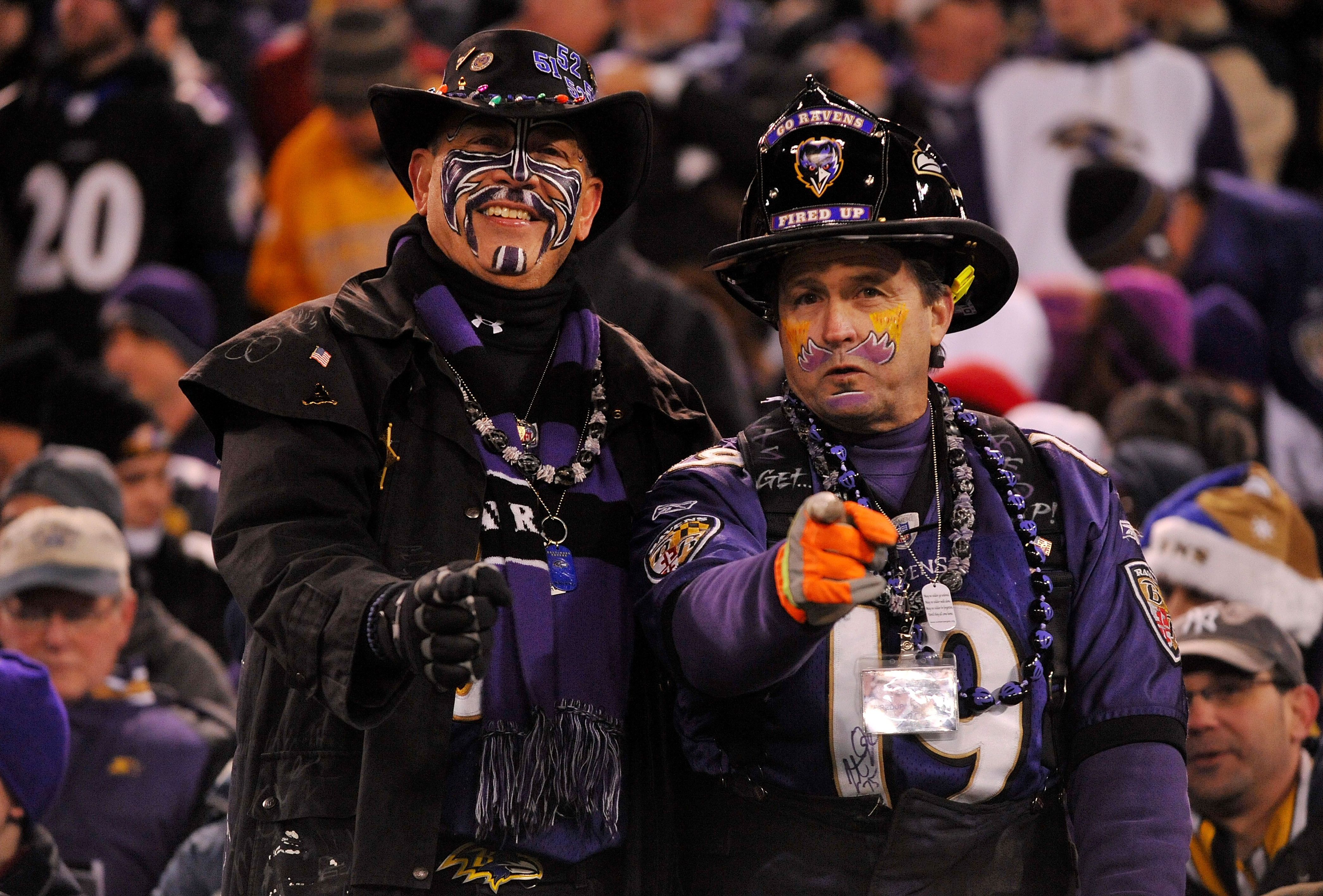 BALTIMORE, MD - DECEMBER 05:  Fans of the Baltimore Ravens smile for a photo during the second quarter of the game against the Pittsburgh Steelers at M&T Bank Stadium on December 5, 2010 in Baltimore, Maryland.  (Photo by Larry French/Getty Images)