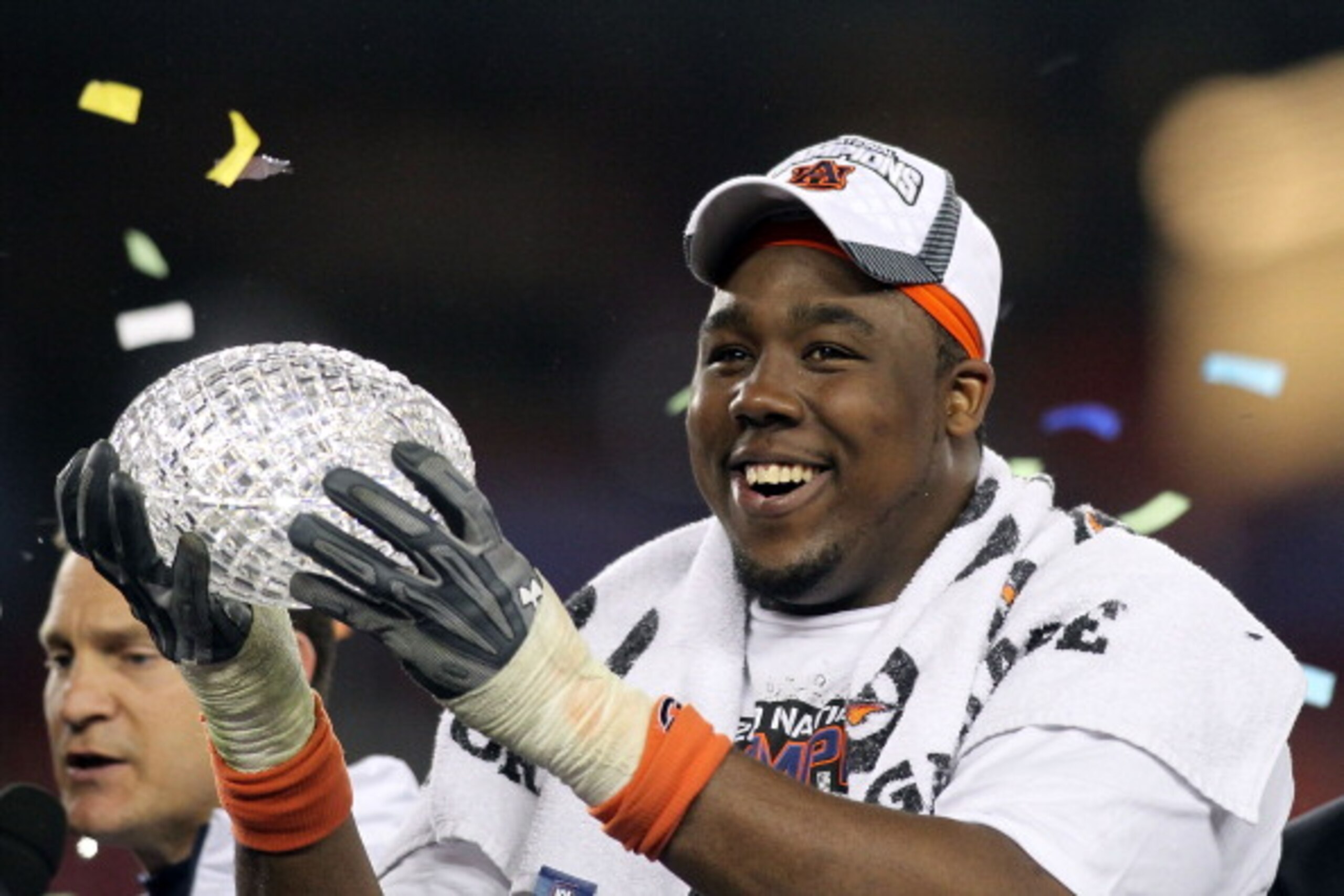 GLENDALE, AZ - JANUARY 10: Nick Fairley #90 of the Auburn Tigers celebrates the Tigers 22-19 victory against the Oregon Ducks during the Tostitos BCS National Championship Game at University of Phoenix Stadium on January 10, 2011 in Glendale, Arizona. ( GLENDALE, AZ - JANUARY 10: Nick Fairley #90 of the Auburn Tigers celebrates the Tigers 22-19 victory against the Oregon Ducks during the Tostitos BCS National Championship Game at University of Phoenix Stadium on January 10, 2011 in Glendale, Arizona. (