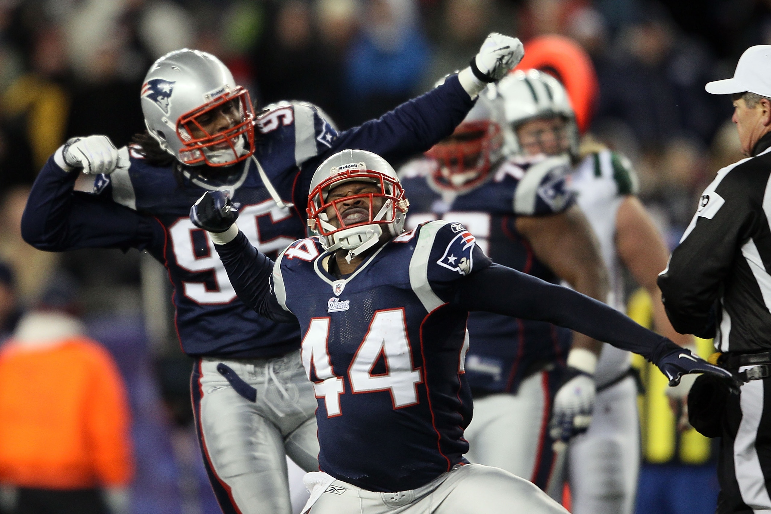 FOXBORO, MA - DECEMBER 06:  (L-R) Jermaine Cunningham #96 and Jarrad Page #44 of the New England Patriots celebrate a defensive stop in the second quarter against the New York Jets at Gillette Stadium on December 6, 2010 in Foxboro, Massachusetts.  (Photo