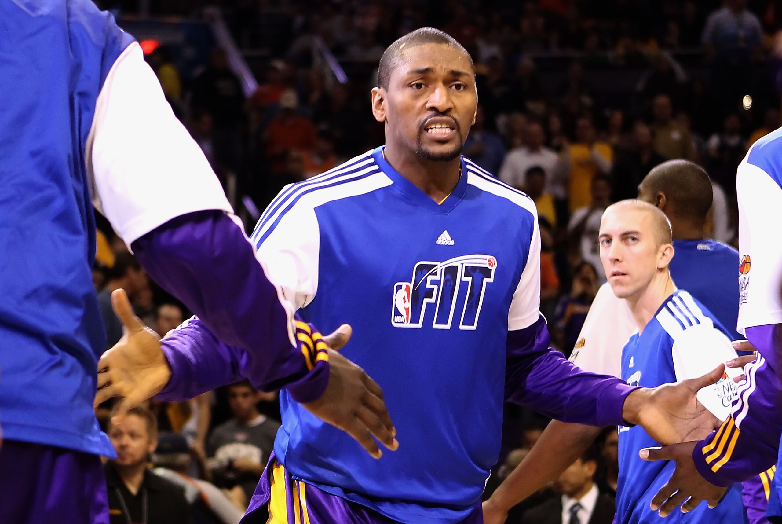 PHOENIX, AZ - JANUARY 05:  Ron Artest #15 of the Los Angeles Lakers is introduced before the NBA game against the Phoenix Suns at US Airways Center on January 5, 2011 in Phoenix, Arizona. The Lakers defeated the Suns 99-95.  NOTE TO USER: User expressly a
