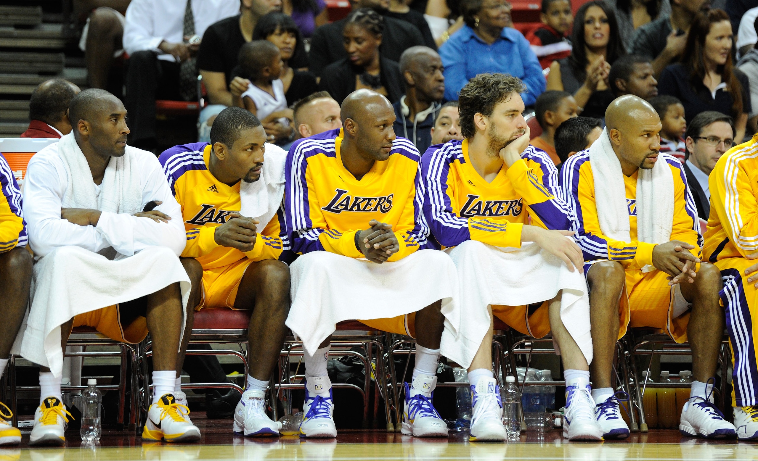 LAS VEGAS - OCTOBER 13:  (L-R) Kobe Bryant #24, Ron Artest #15, Lamar Odom #7, Pau Gasol #16 and Derek Fisher #2 of the Los Angeles Lakers watch from the bench during a preseason game against the Sacramento Kings at the Thomas & Mack Center October 13, 20