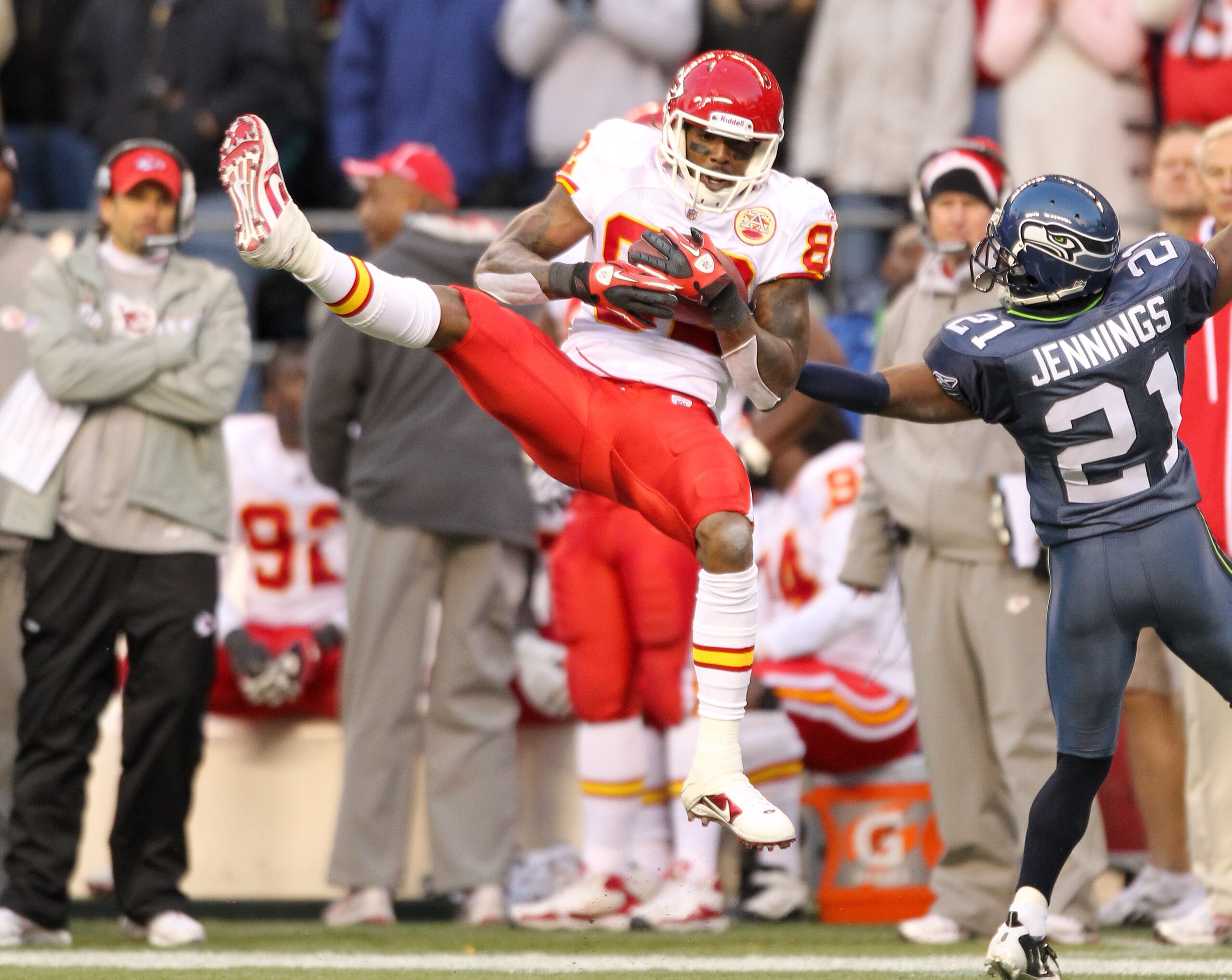 SEATTLE, WA - NOVEMBER 28:  Wide receiver Dwayne Bowe #82 of the Kansas City Chiefs makes a catch for a first down with under six minutes to go against Kelly Jennings #21 of the Seattle Seahawks at Qwest Field on November 28, 2010 in Seattle, Washington.