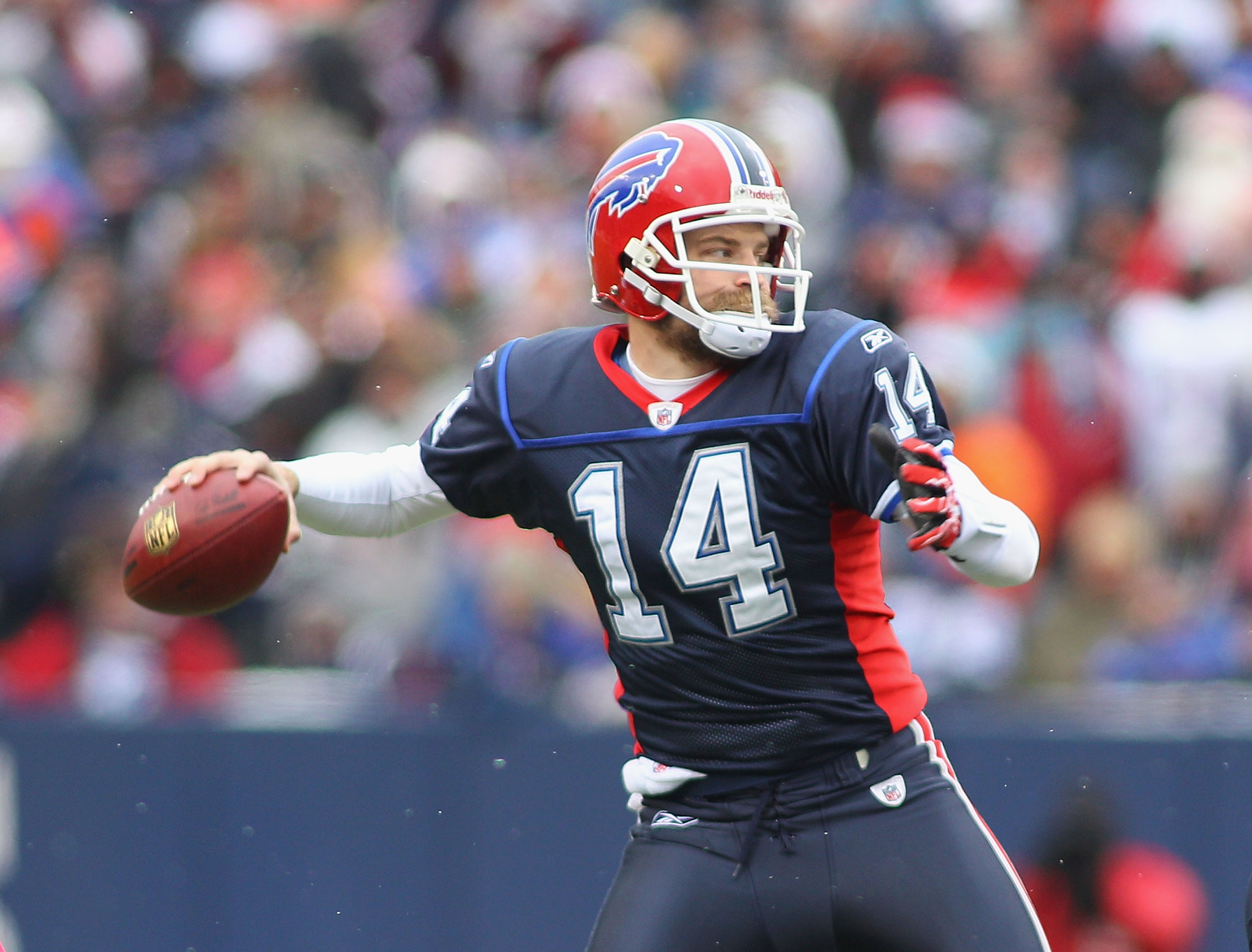 ORCHARD PARK, NY - DECEMBER 26:  Ryan Fitzpatrick #14 of the Buffalo Bills readies to pass against the New England Patriots at Ralph Wilson Stadium on December 26, 2010 in Orchard Park, New York.  (Photo by Rick Stewart/Getty Images)