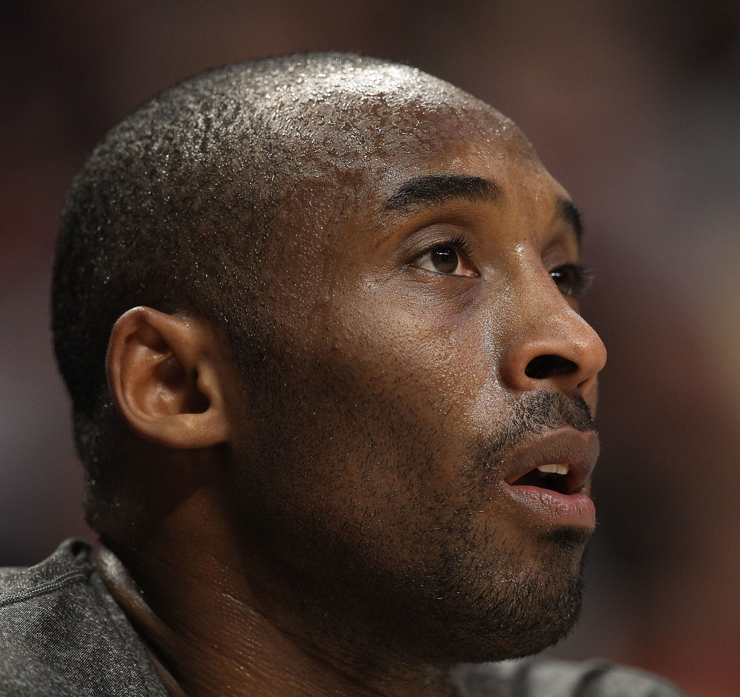 CHICAGO, IL - DECEMBER 10: Kobe Bryant #24 of the Los Angeles Lakers watches from the bench as his teammates take on the Chicago Bulls at the United Center on December 10, 2010 in Chicago, Illinois. The Bulls defeated the Lakers 88-84. NOTE TO USER: User