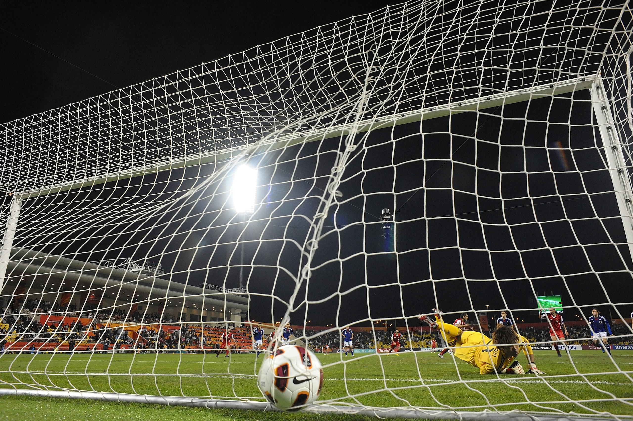 DOHA, QATAR - JANUARY 13:  Firas Al Khatib of Sylia scores the first goal for Sylia  during the Asian Cup Group B match between Syria and Japan at Qatar Sports Club Stadium on January 13, 2011 in Doha, Qatar. (Photo by Koki Nagahama/Getty Images)